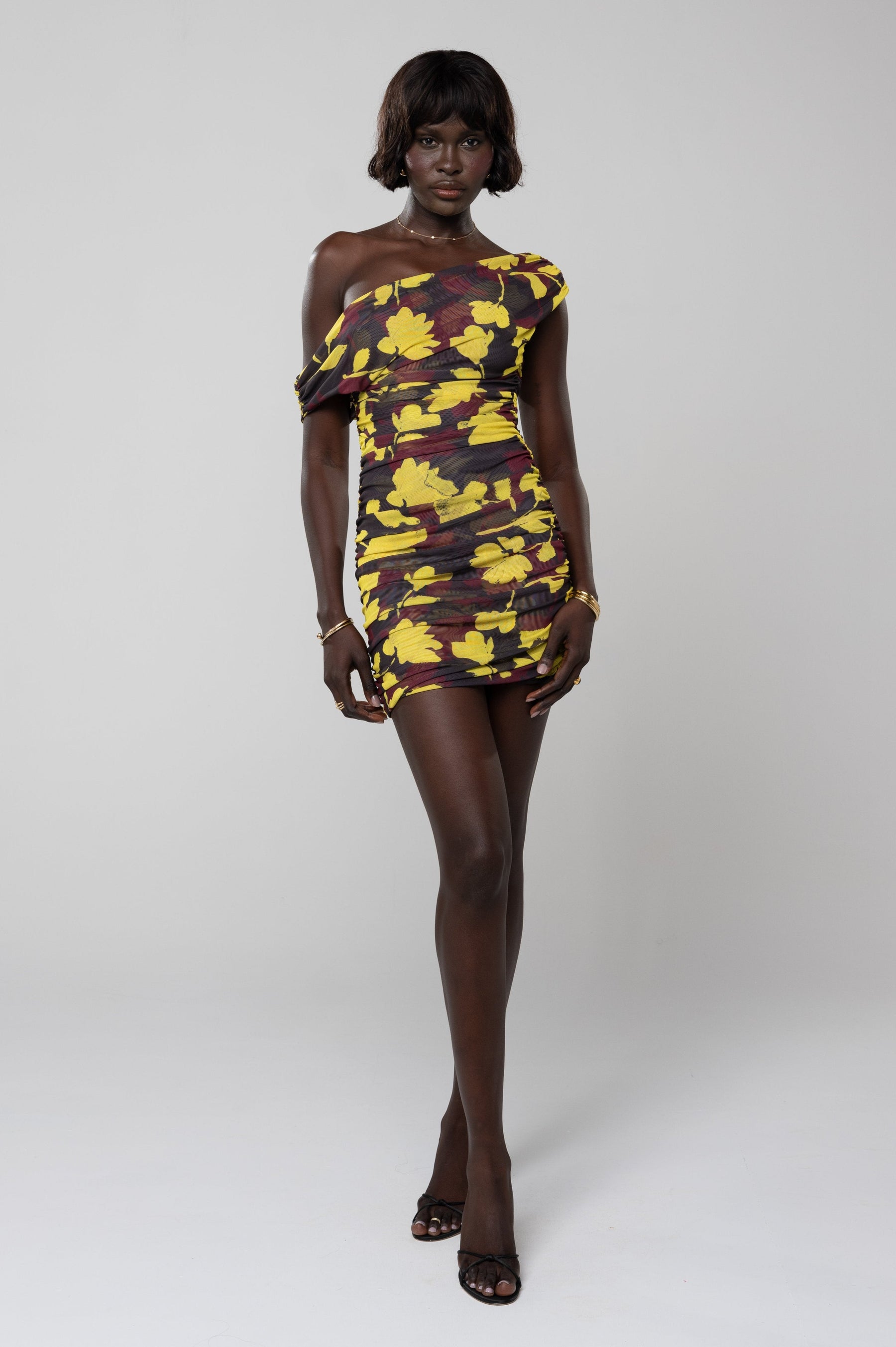 This is an image of Beverly Mini in Sangria - RESA featuring a model wearing the dress