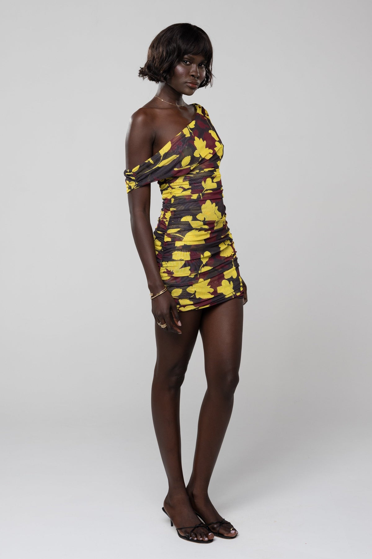 This is an image of Beverly Mini in Sangria - RESA featuring a model wearing the dress