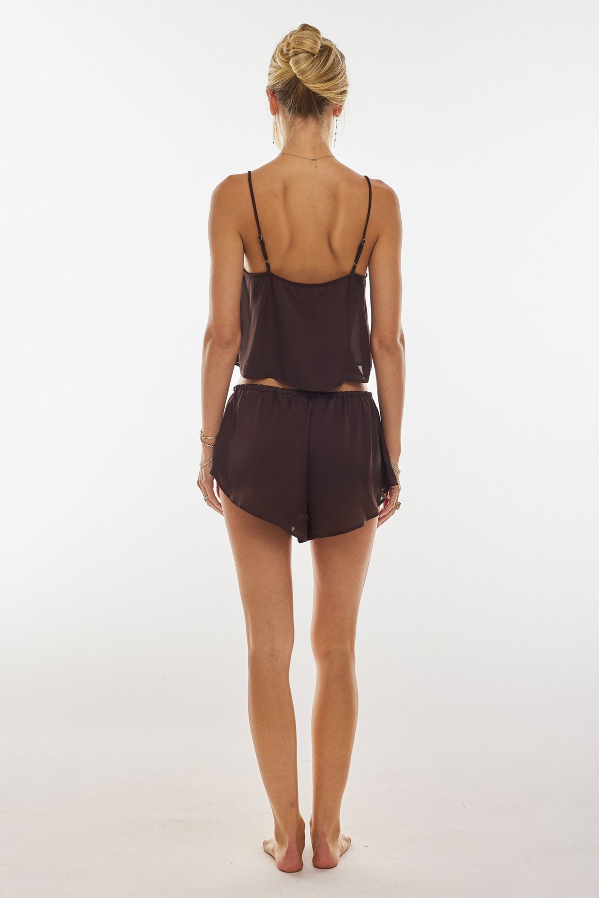 This is an image of Blair Top in Chocolate - RESA featuring a model wearing the dress