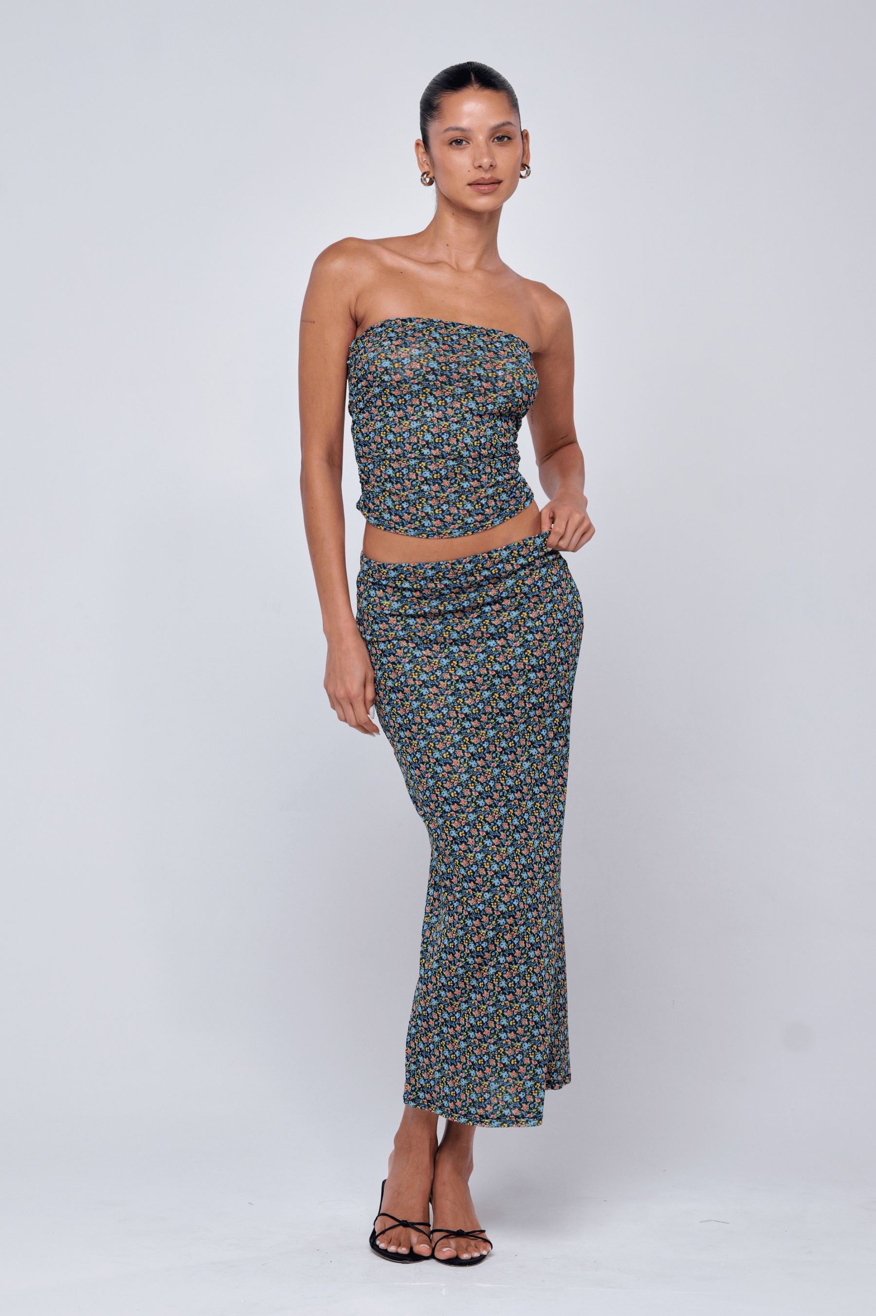 This is an image of Bonnie Mesh Top in Paros - RESA featuring a model wearing the dress