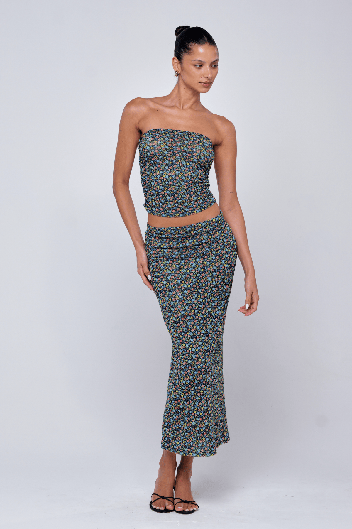 This is an image of Bonnie Mesh Top in Paros - RESA featuring a model wearing the dress