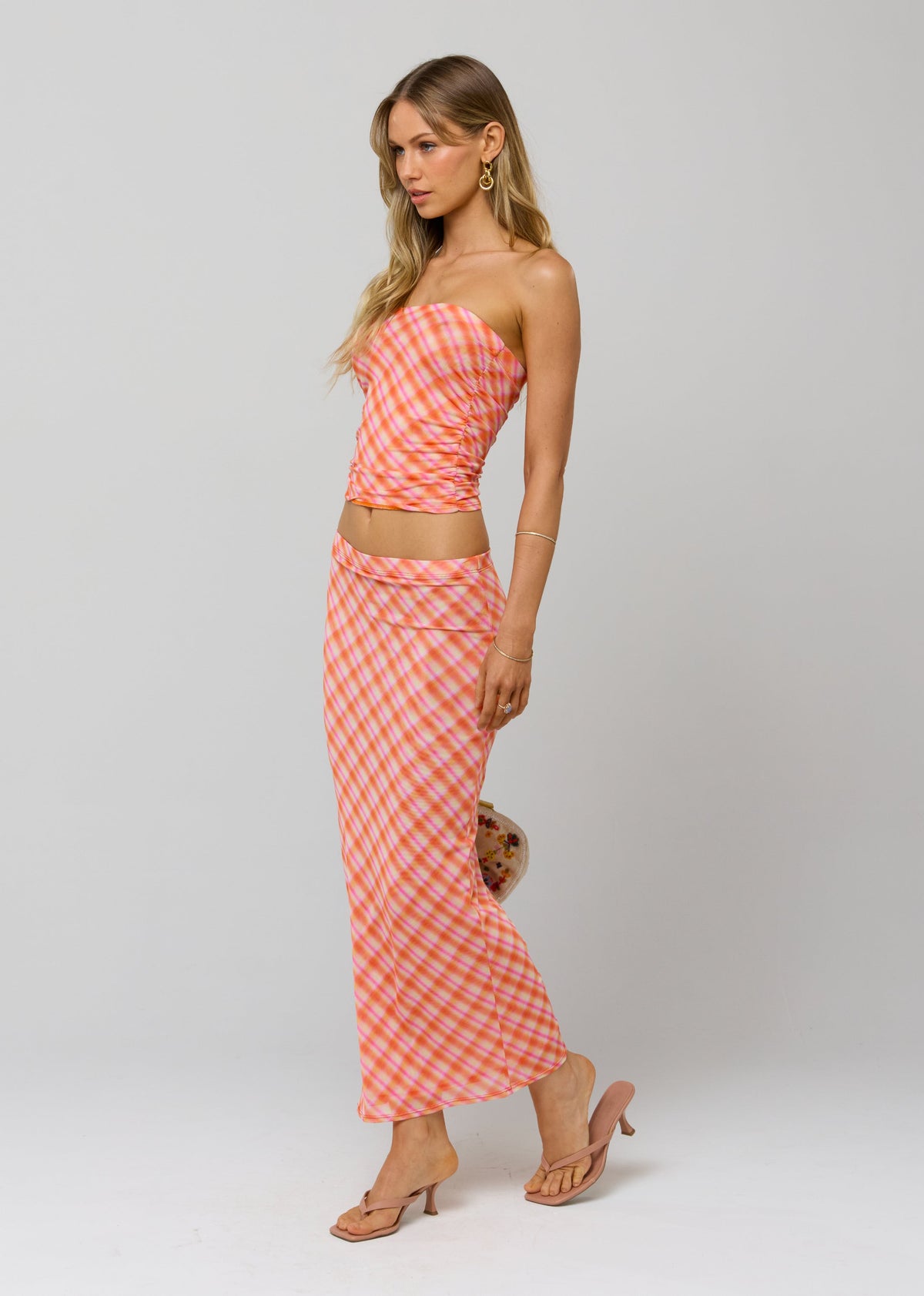 This is an image of Bonnie Mesh Top in Sorbet - RESA featuring a model wearing the dress