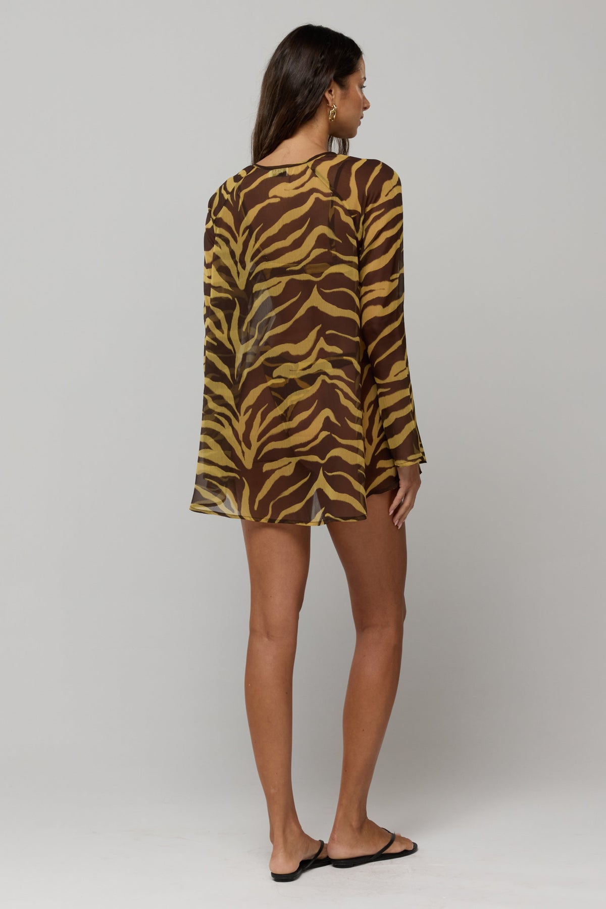 This is an image of Bre Dress in Raja - RESA featuring a model wearing the dress