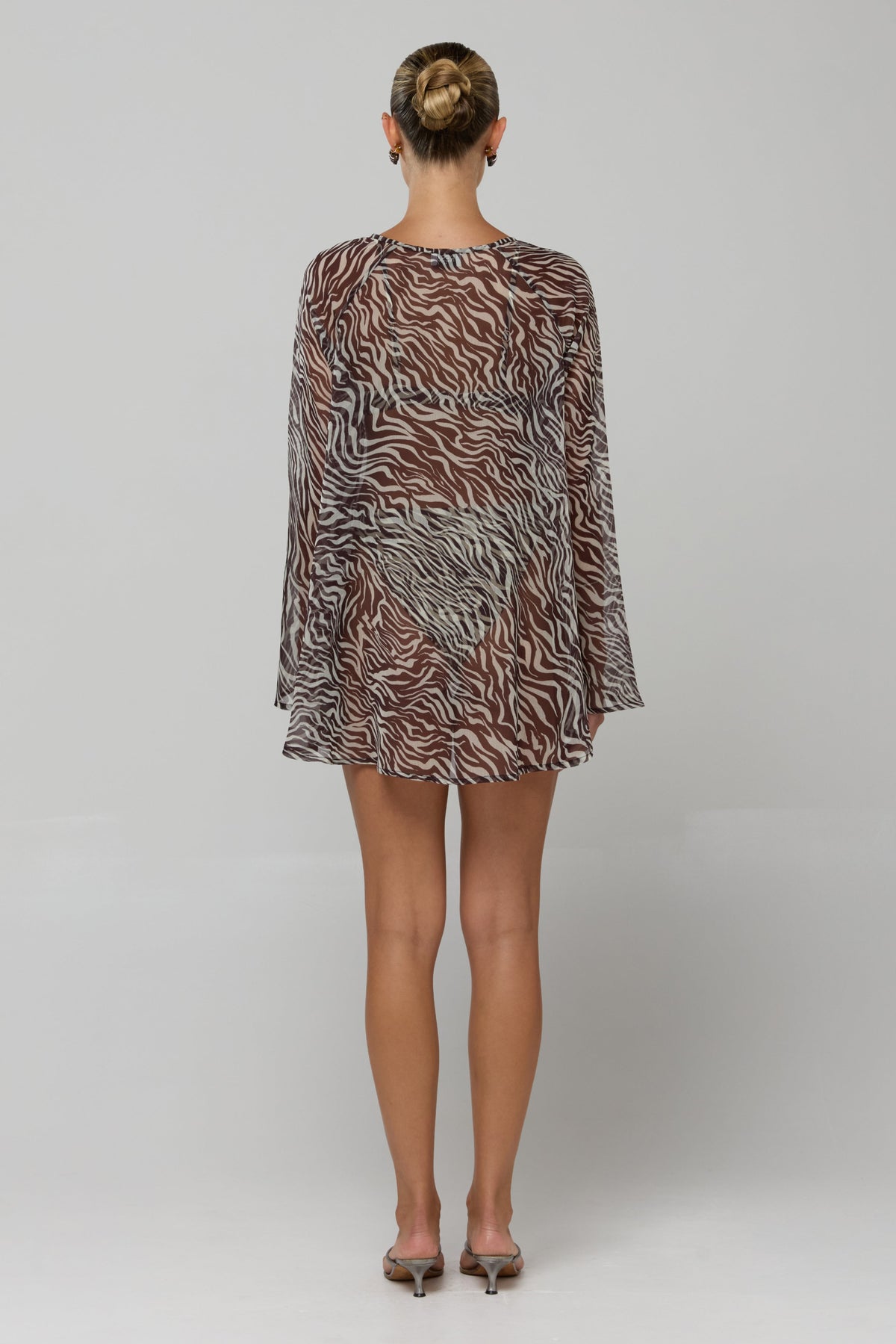 This is an image of Bre Dress in Selva - RESA featuring a model wearing the dress