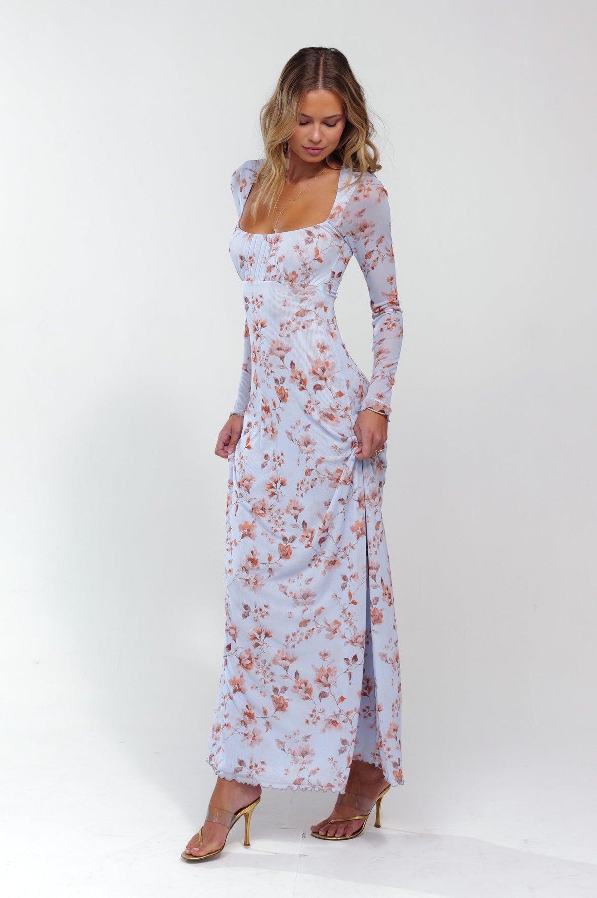 This is an image of Brittany Dress in Whimsy - RESA featuring a model wearing the dress