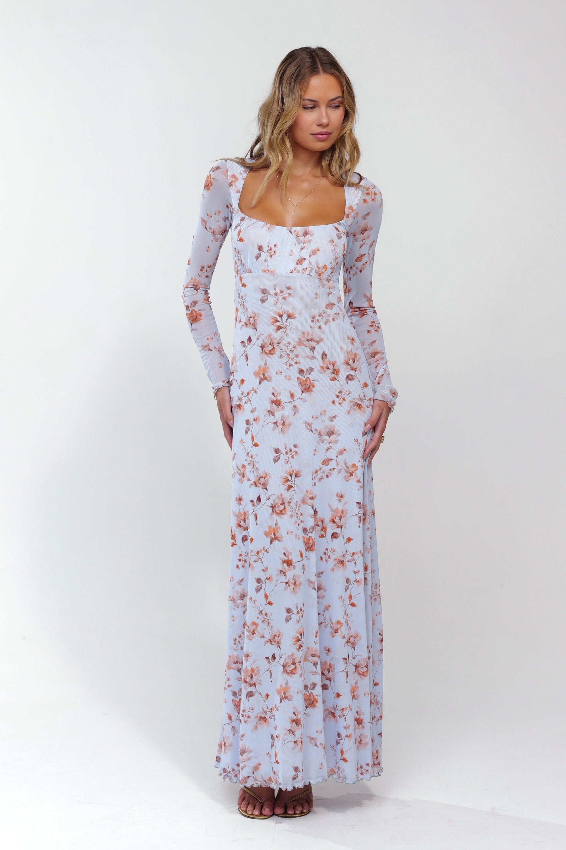 This is an image of Brittany Dress in Whimsy - RESA featuring a model wearing the dress