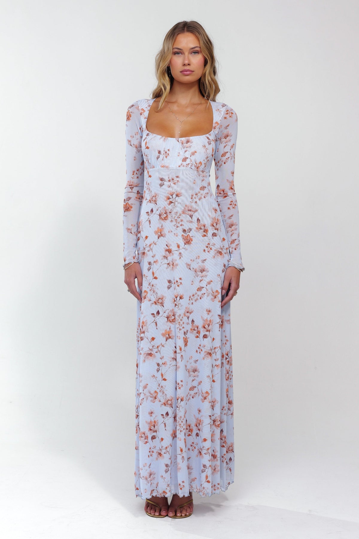 This is an image of Brittany Dress in Whimsy - RESA featuring a model wearing the dress