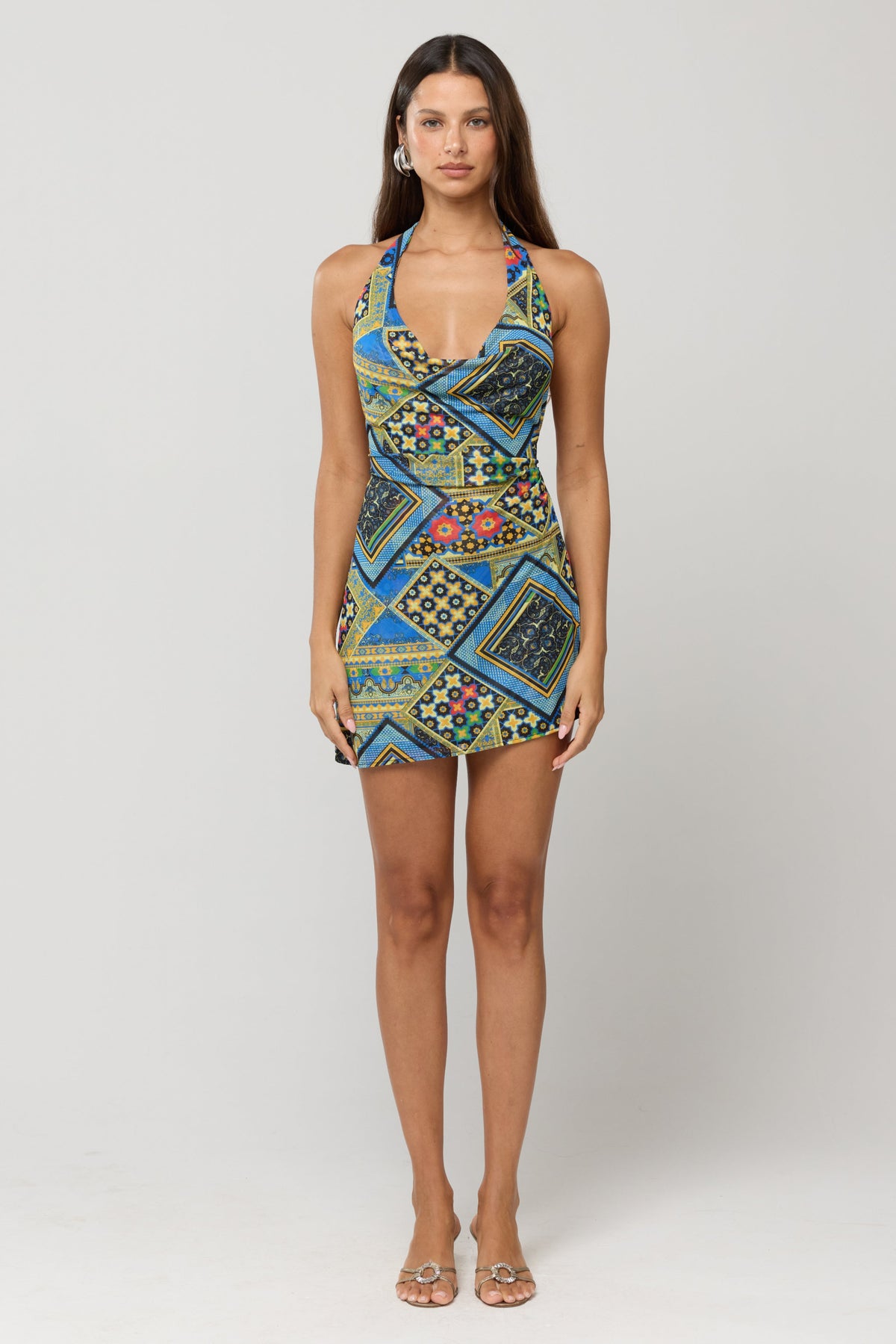 This is an image of Bruna Dress in Casino - RESA featuring a model wearing the dress
