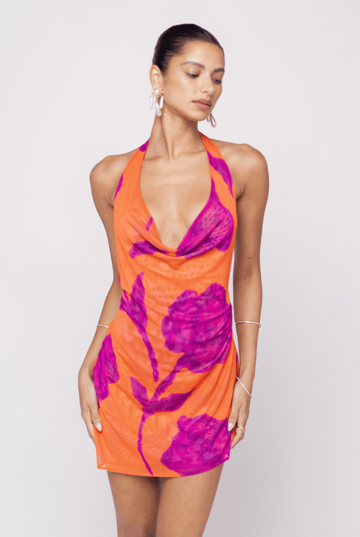 This is an image of Bruna Dress in Mandarin - RESA featuring a model wearing the dress
