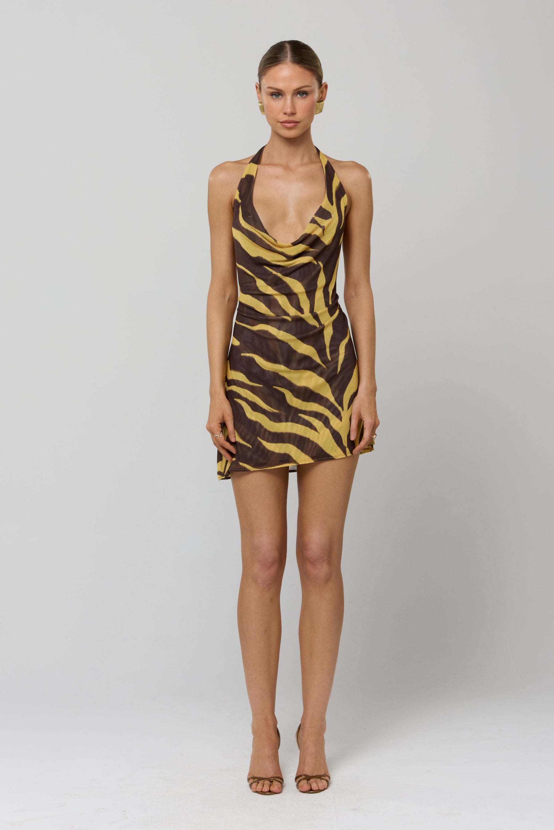 This is an image of Bruna Dress in Raja - RESA featuring a model wearing the dress
