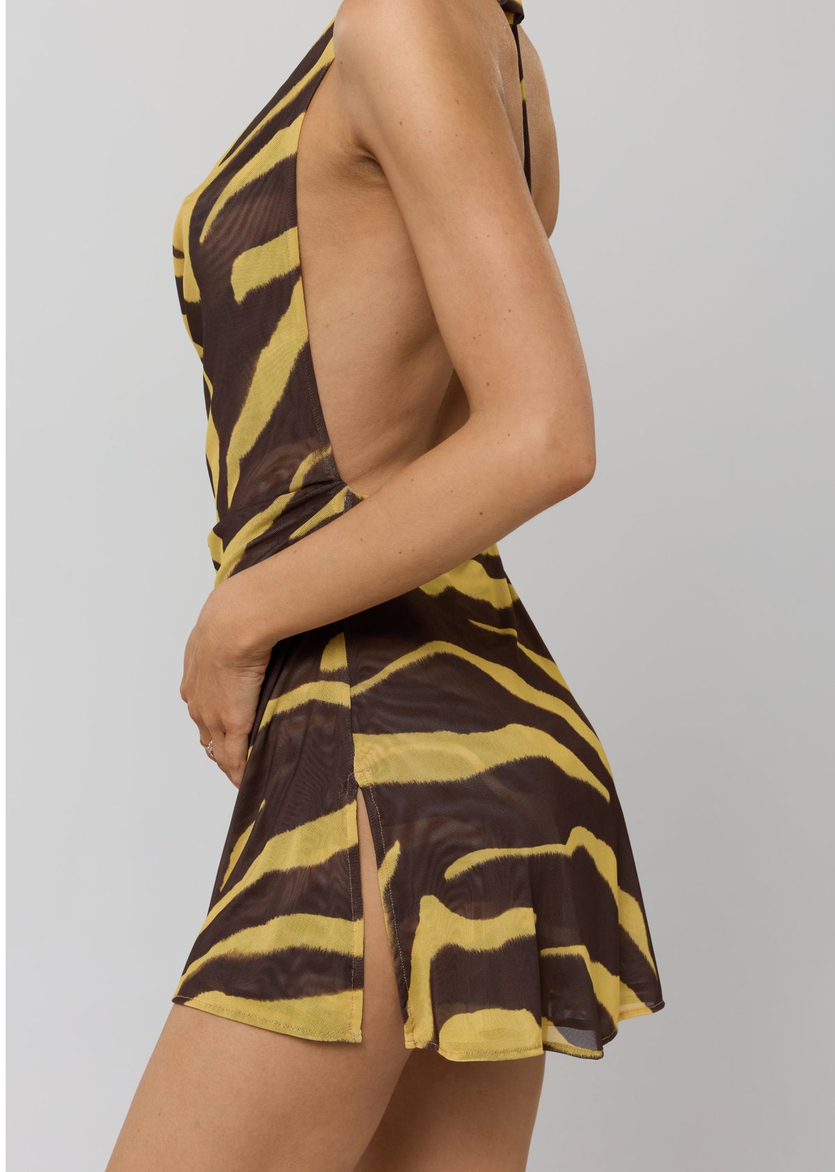 This is an image of Bruna Dress in Raja - RESA featuring a model wearing the dress