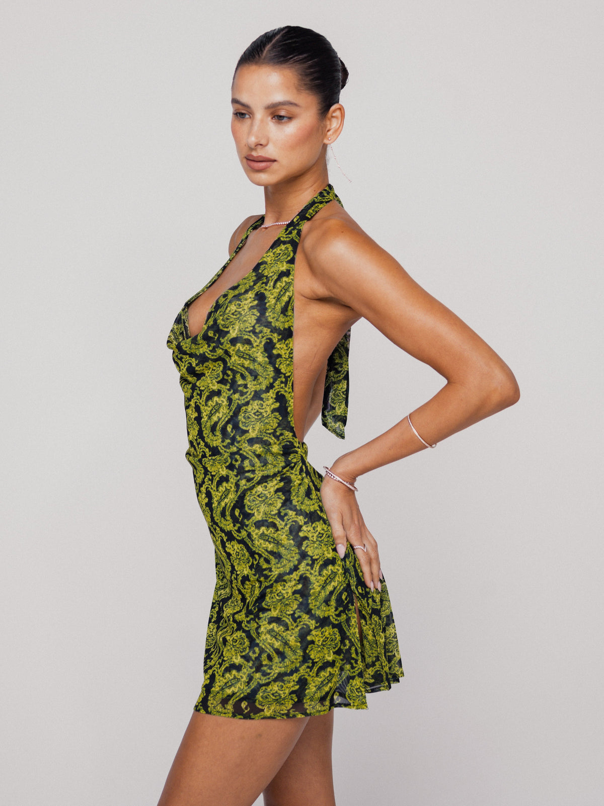 This is an image of Bruna Dress in Sorrento - RESA featuring a model wearing the dress