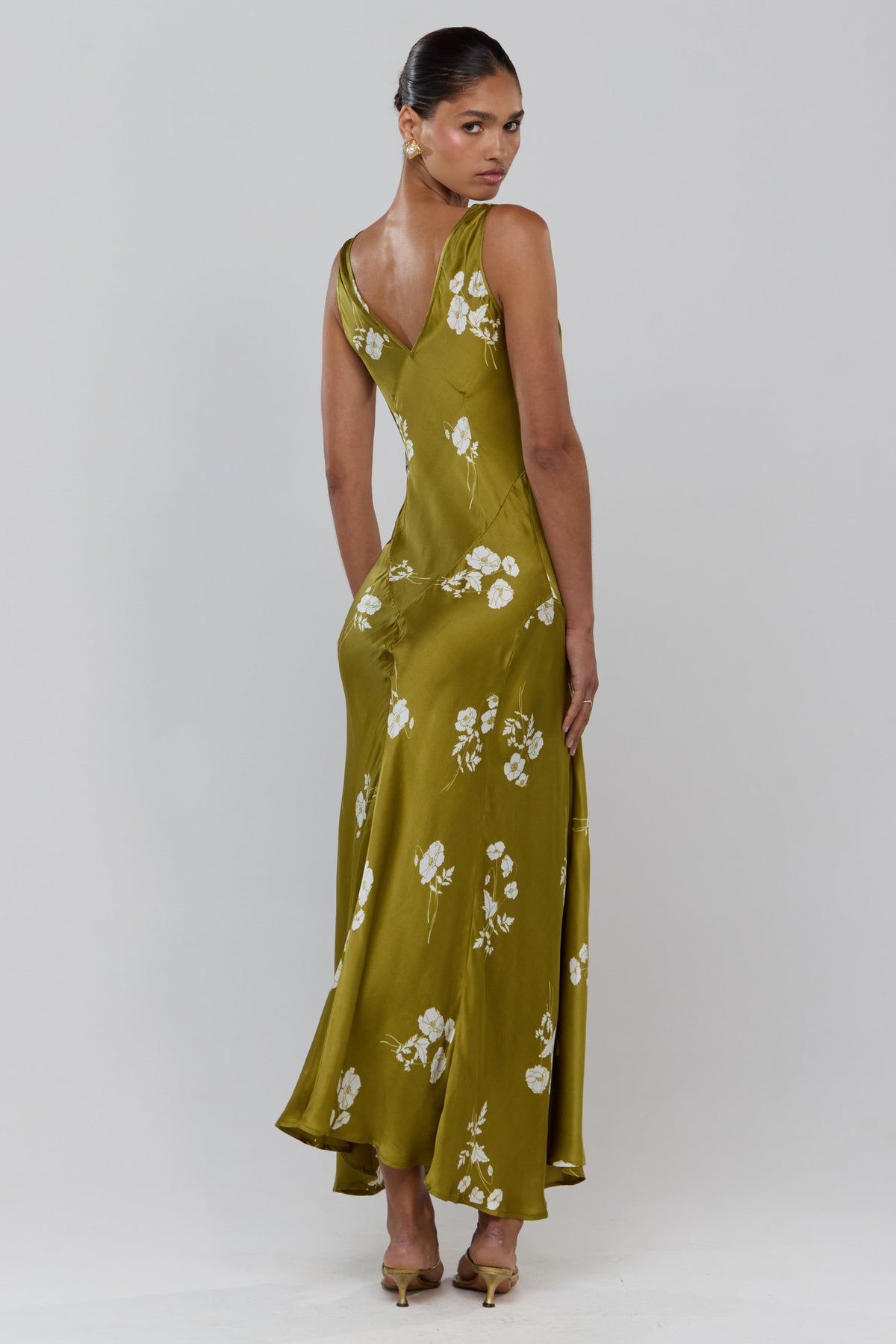 This is an image of Camilla in Moss - RESA featuring a model wearing the dress