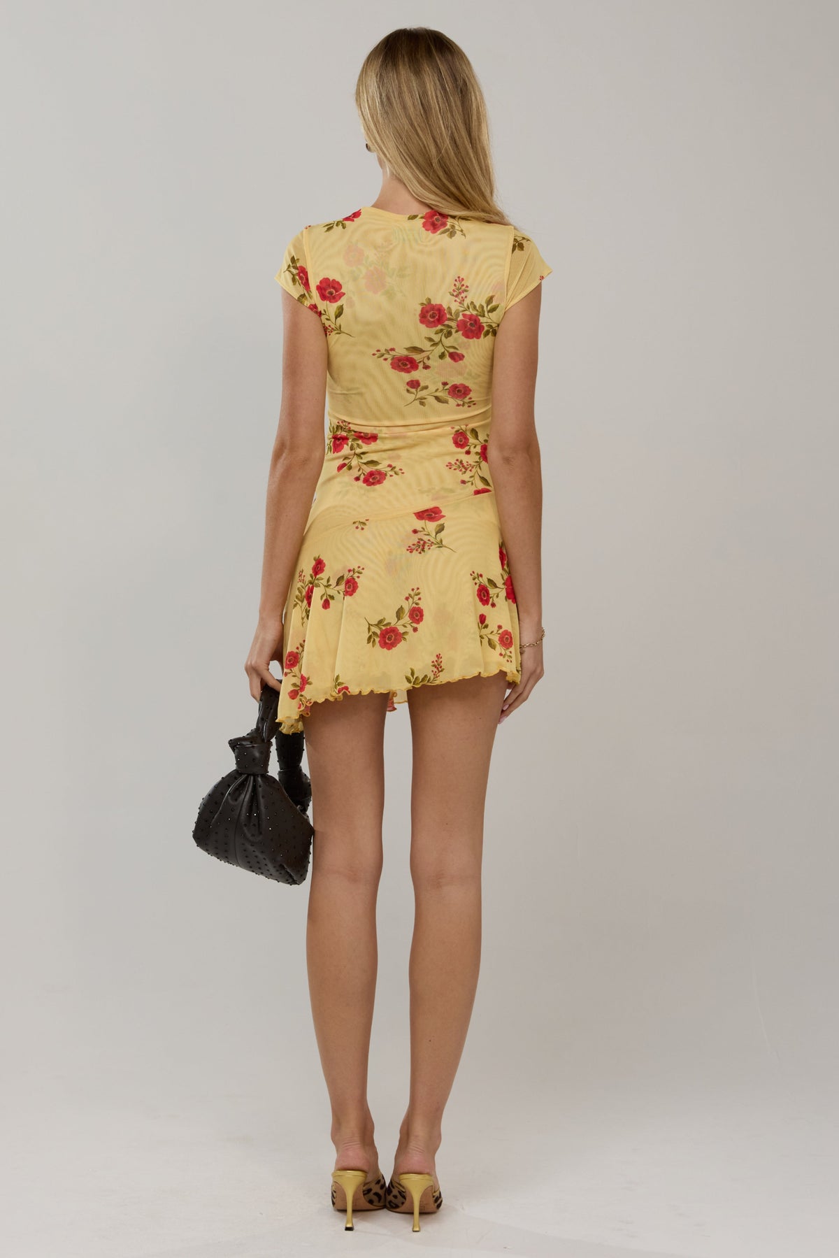 This is an image of Cece in Saffron - RESA featuring a model wearing the dress