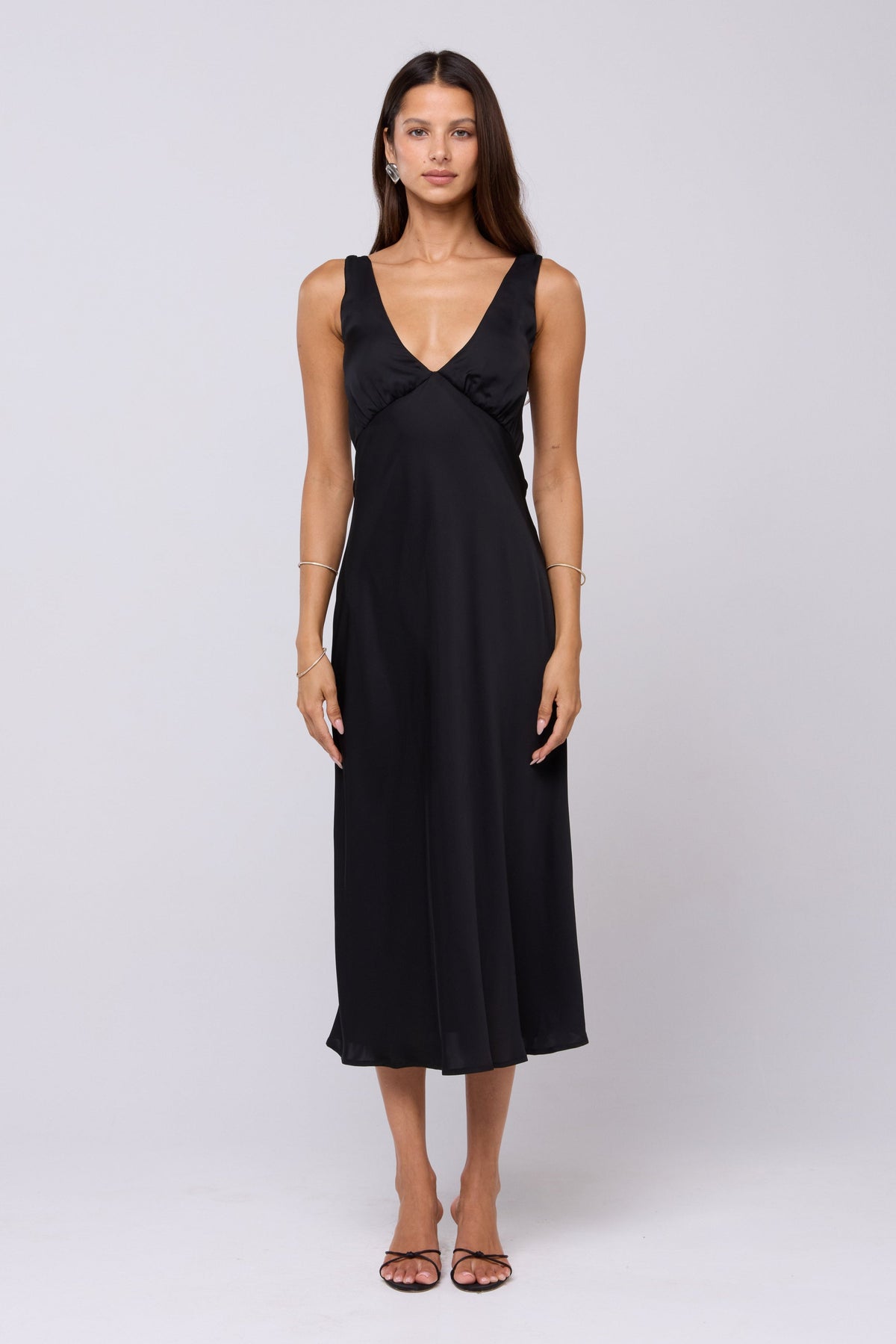 This is an image of Charlie Dress in Black - RESA featuring a model wearing the dress