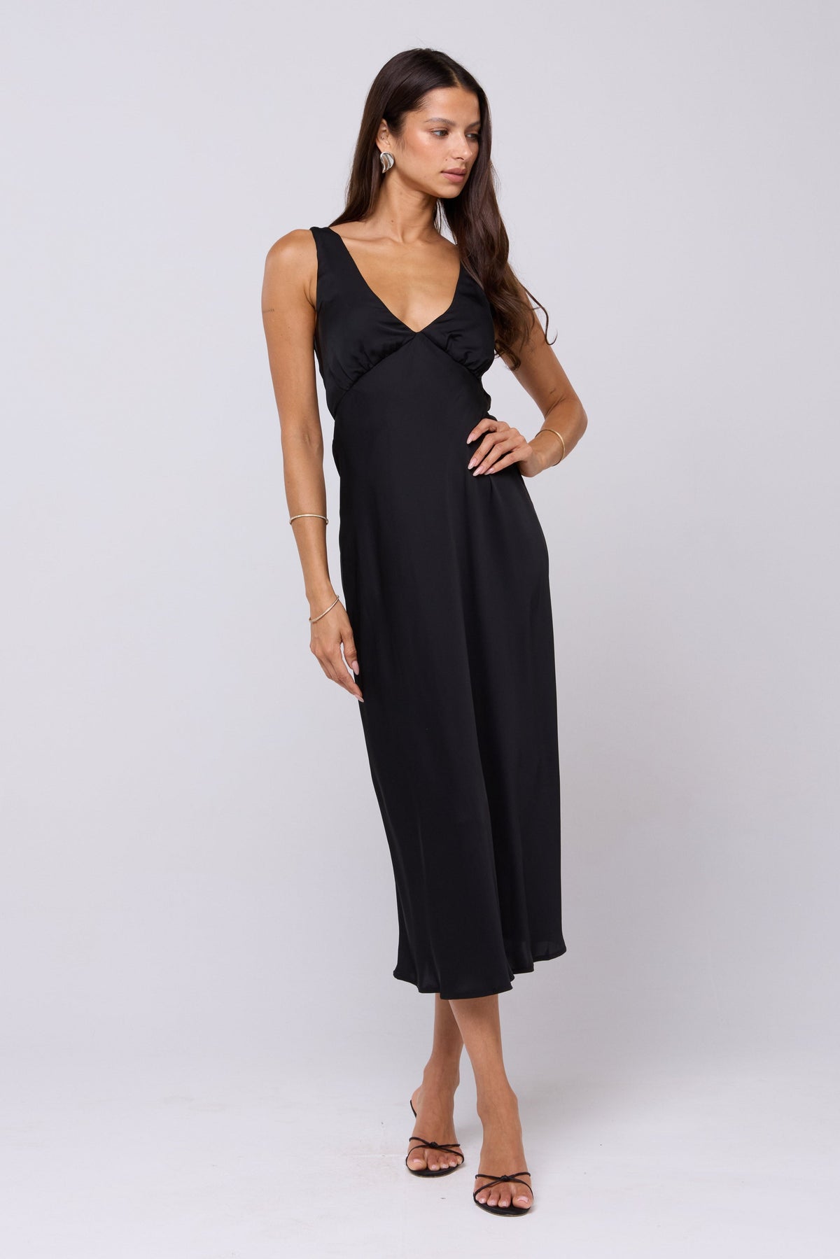 This is an image of Charlie Dress in Black - RESA featuring a model wearing the dress