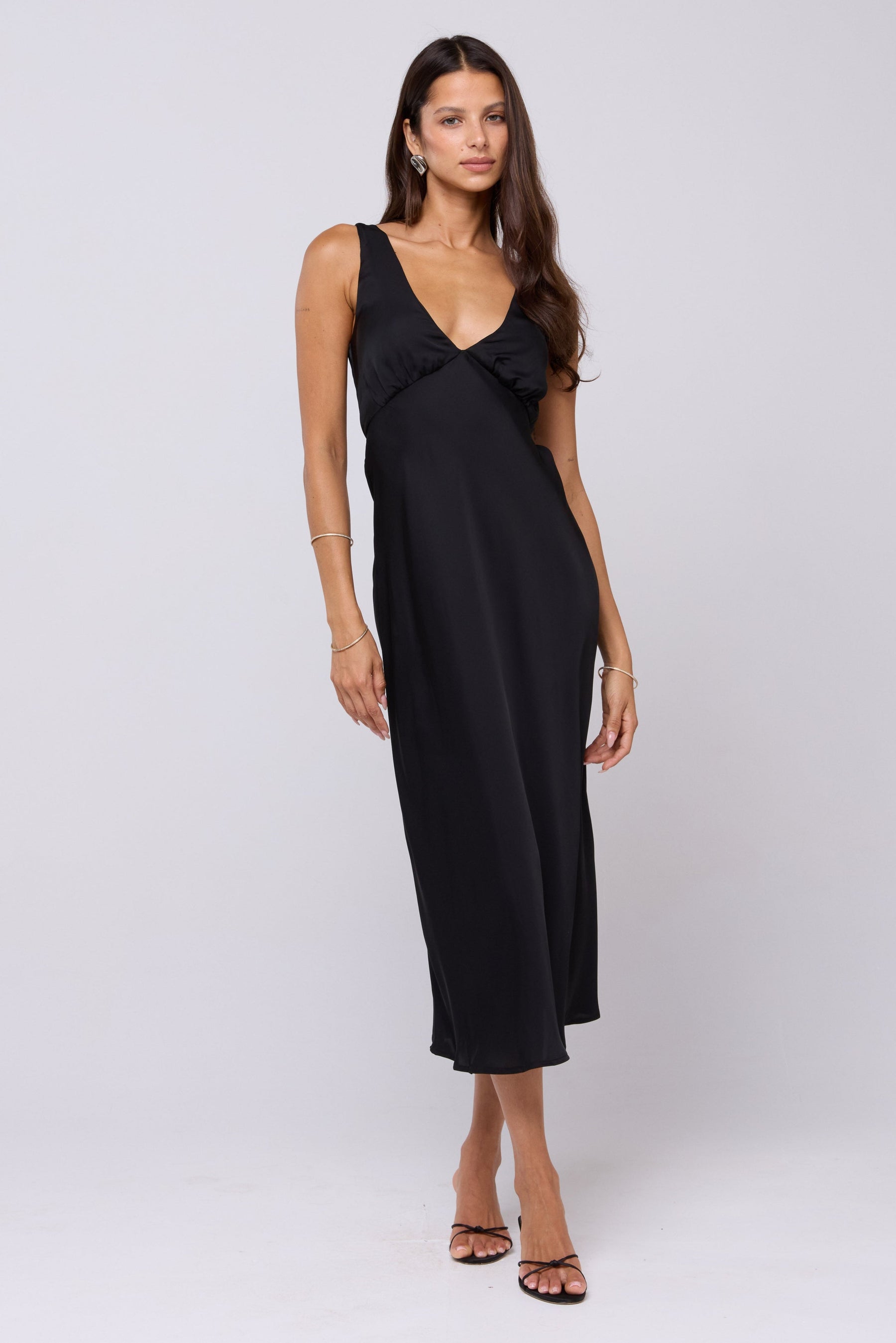 This is an image of Charlie Dress in Black - RESA featuring a model wearing the dress