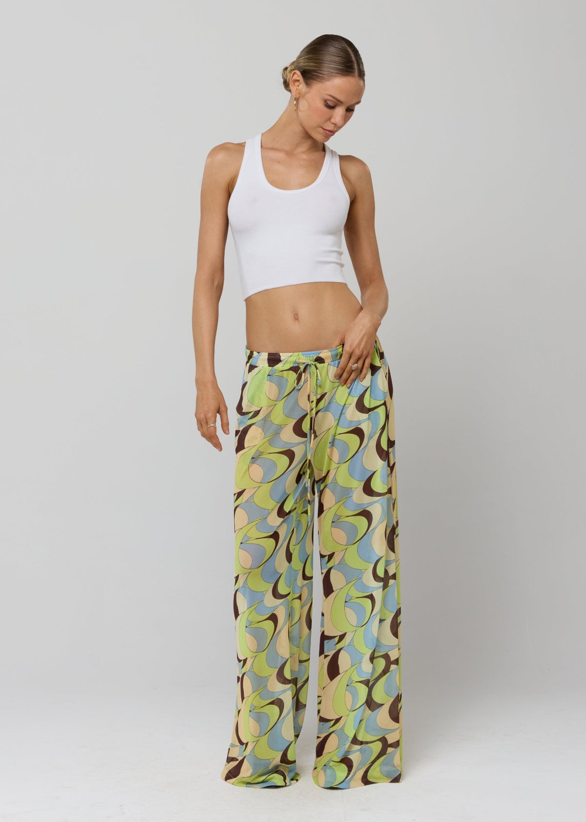 This is an image of Chase Mesh Pant in Palm Royale - RESA featuring a model wearing the dress