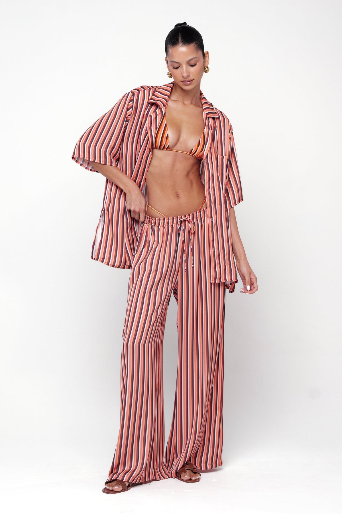 This is an image of Chase Pant in Studio 54 - RESA featuring a model wearing the dress