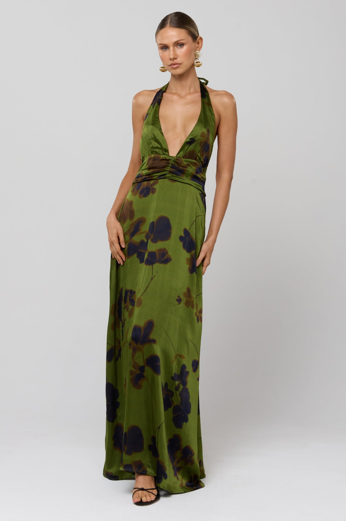 This is an image of Chelsea Dress in Evergreen - RESA featuring a model wearing the dress