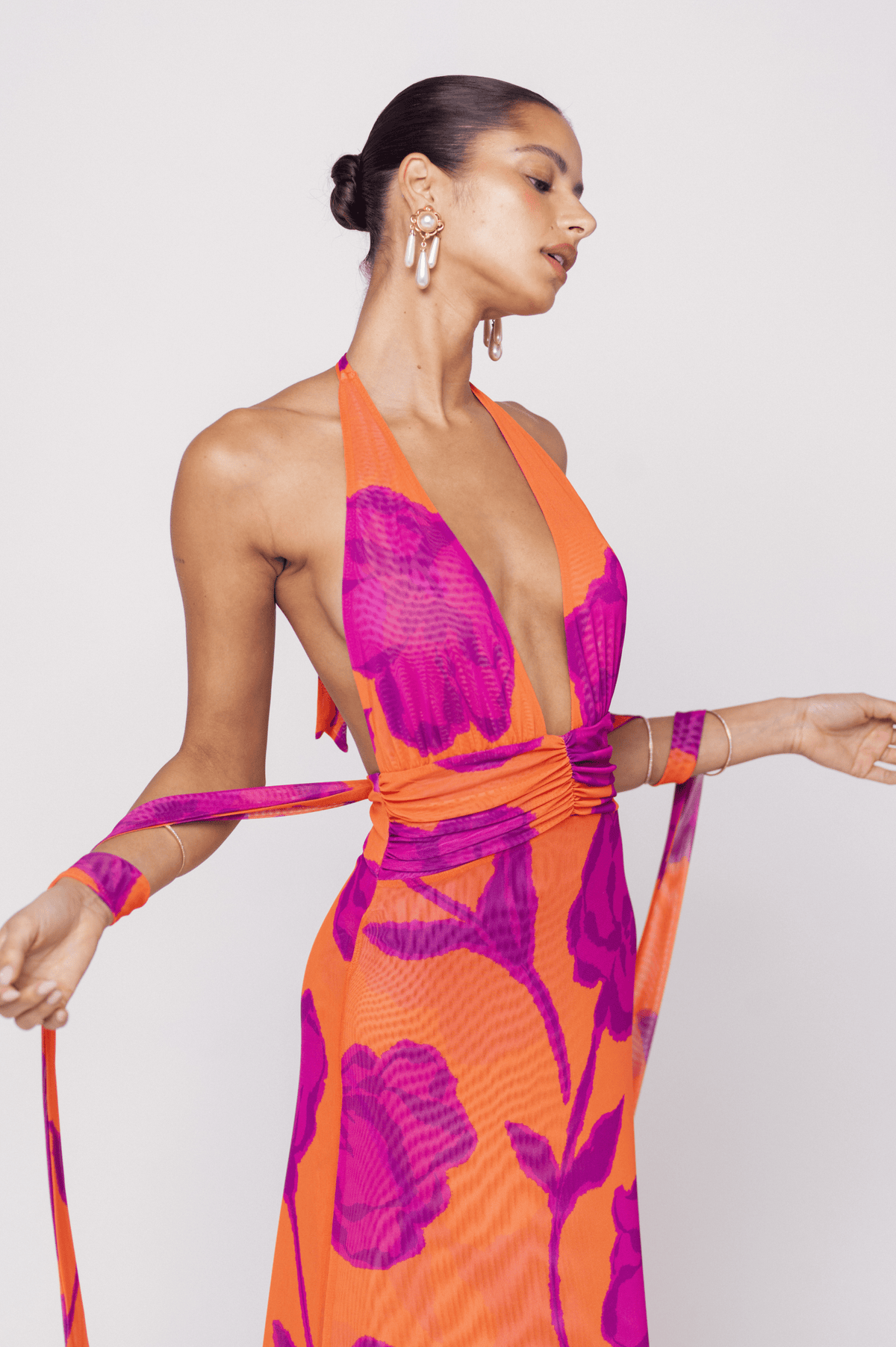 This is an image of Chelsea Dress in Mandarin - RESA featuring a model wearing the dress