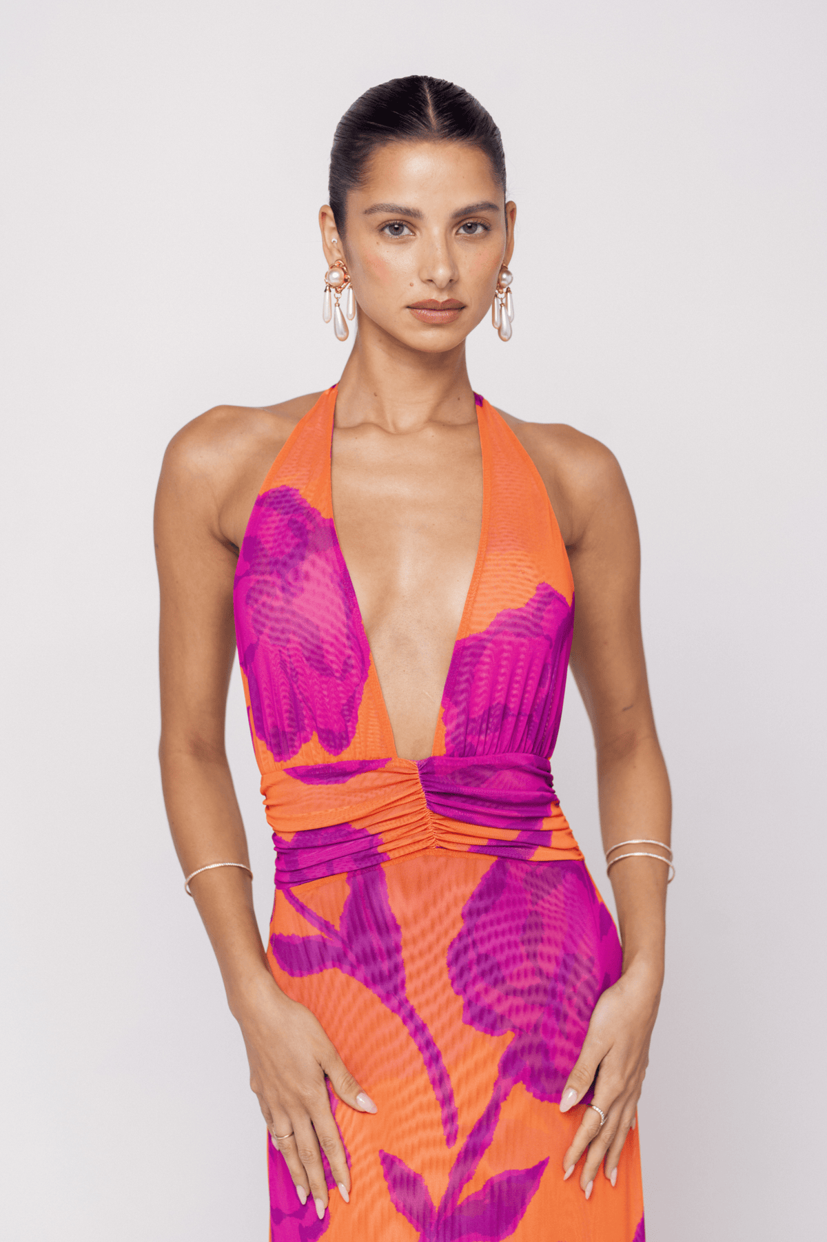This is an image of Chelsea Dress in Mandarin - RESA featuring a model wearing the dress