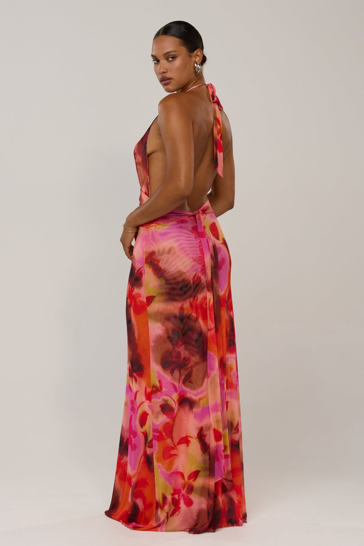This is an image of Chelsea in Lilikoi - RESA featuring a model wearing the dress