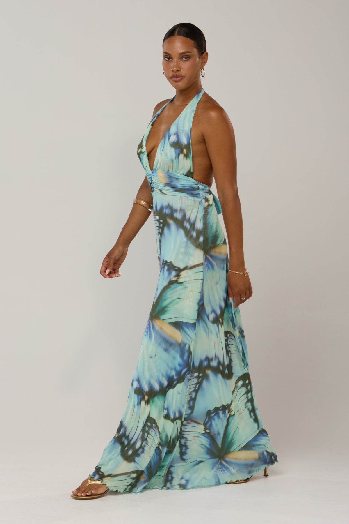 This is an image of Chelsea in Mariposa - RESA featuring a model wearing the dress