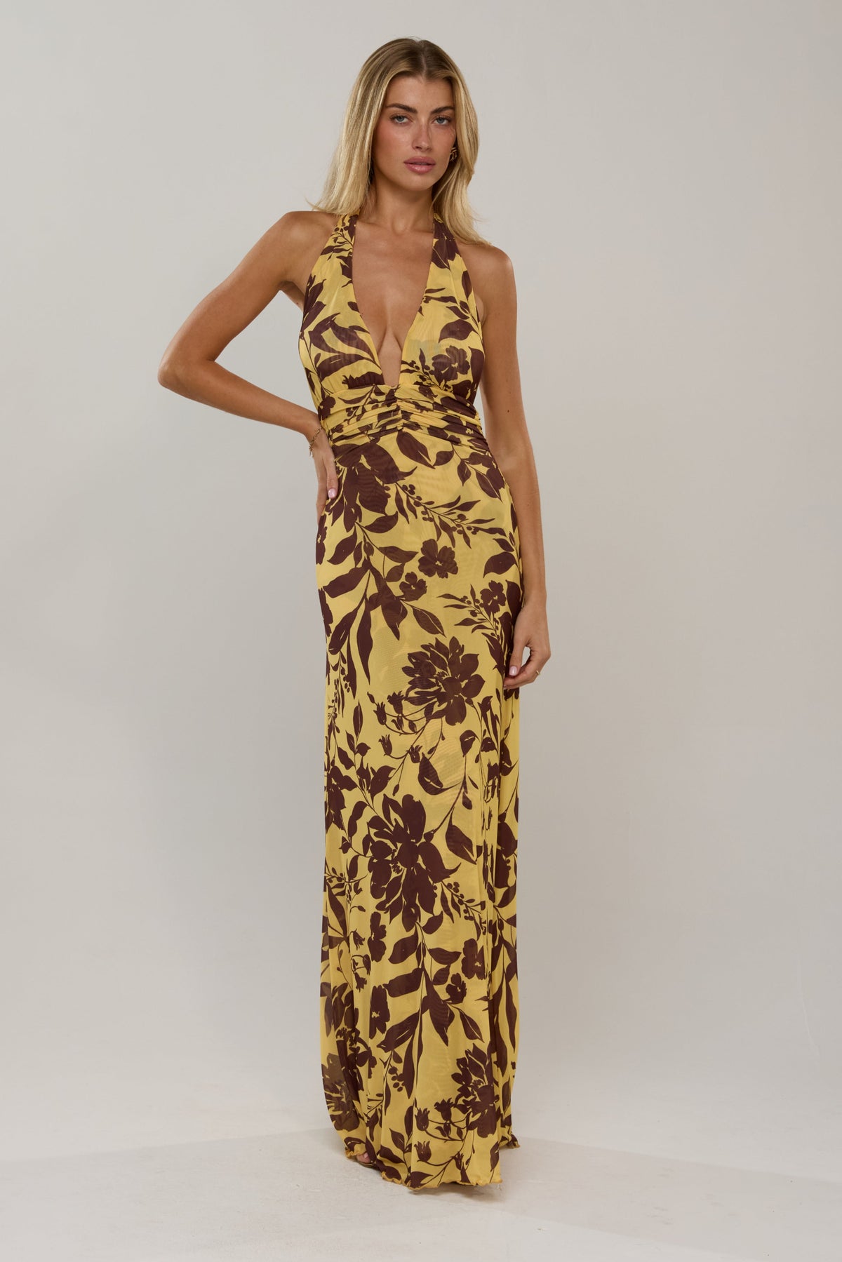 This is an image of Chelsea in Mesa - RESA featuring a model wearing the dress