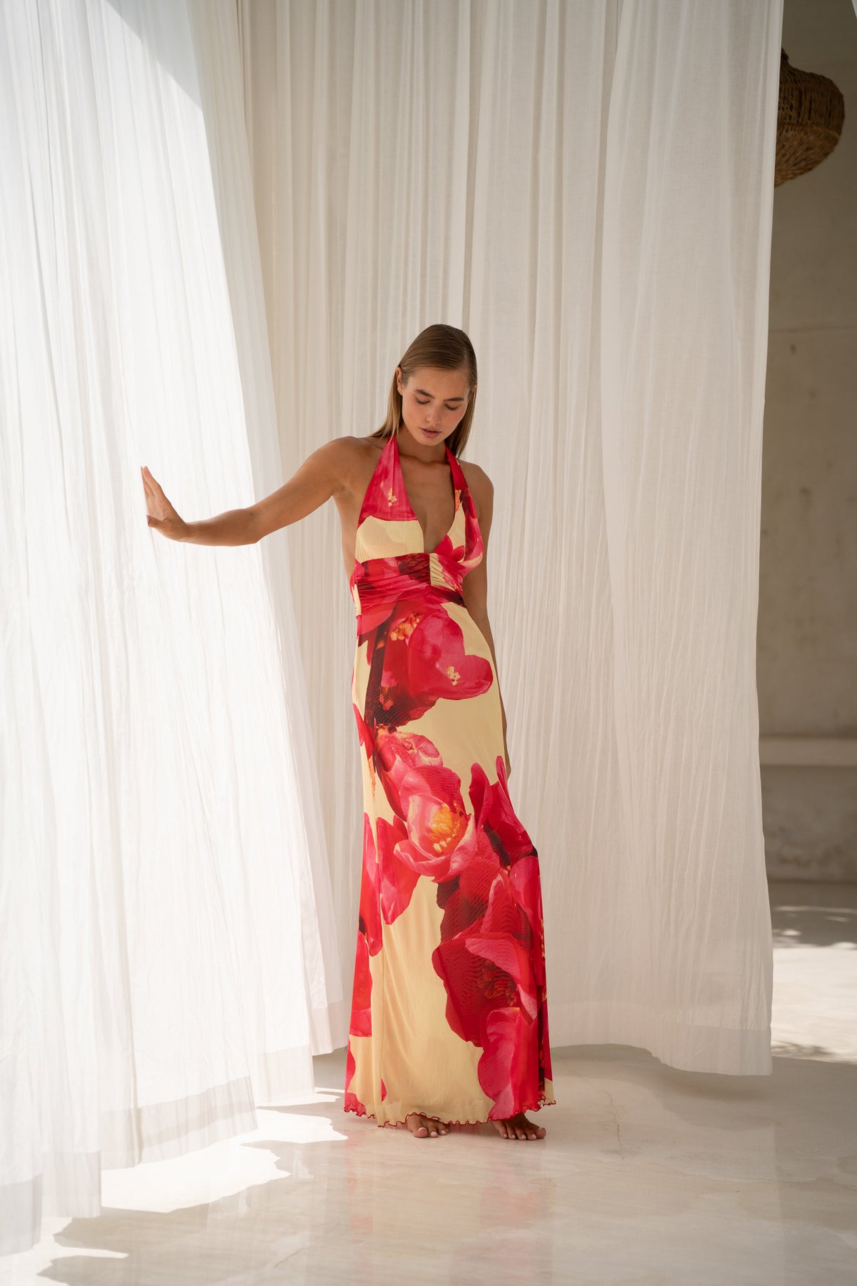 This is an image of Chelsea Maxi Dress in Crawford - RESA featuring a model wearing the dress