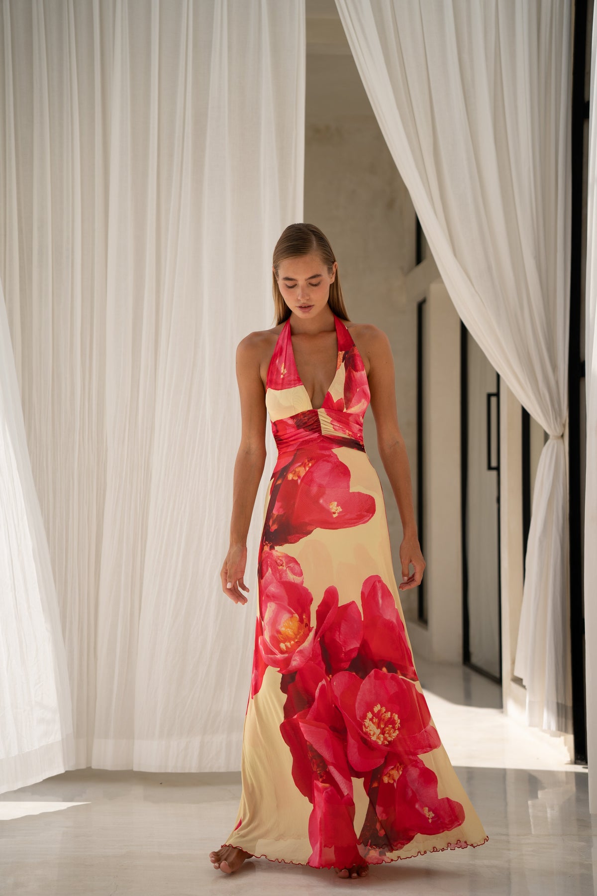 This is an image of Chelsea Maxi Dress in Crawford - RESA featuring a model wearing the dress