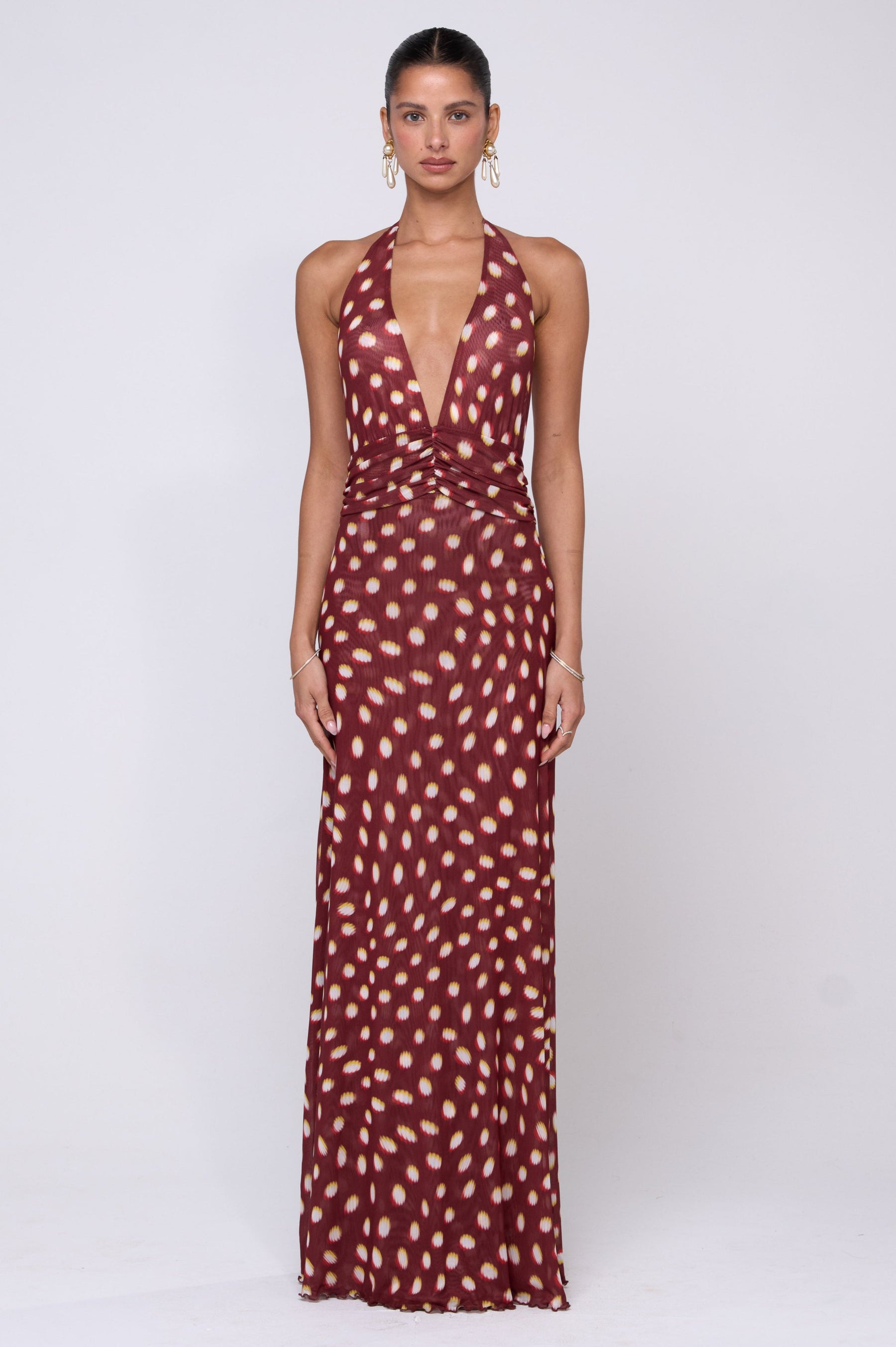 This is an image of Chelsea Maxi Dress in Spice - RESA featuring a model wearing the dress