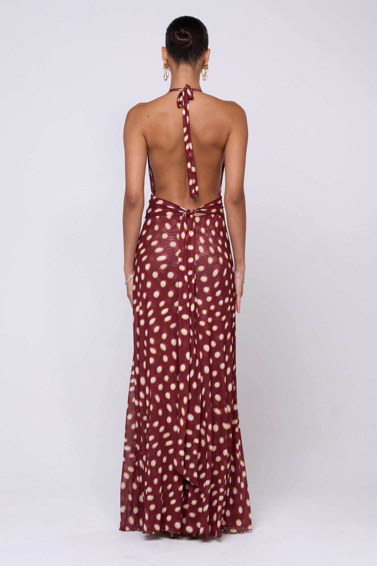This is an image of Chelsea Maxi Dress in Spice - RESA featuring a model wearing the dress