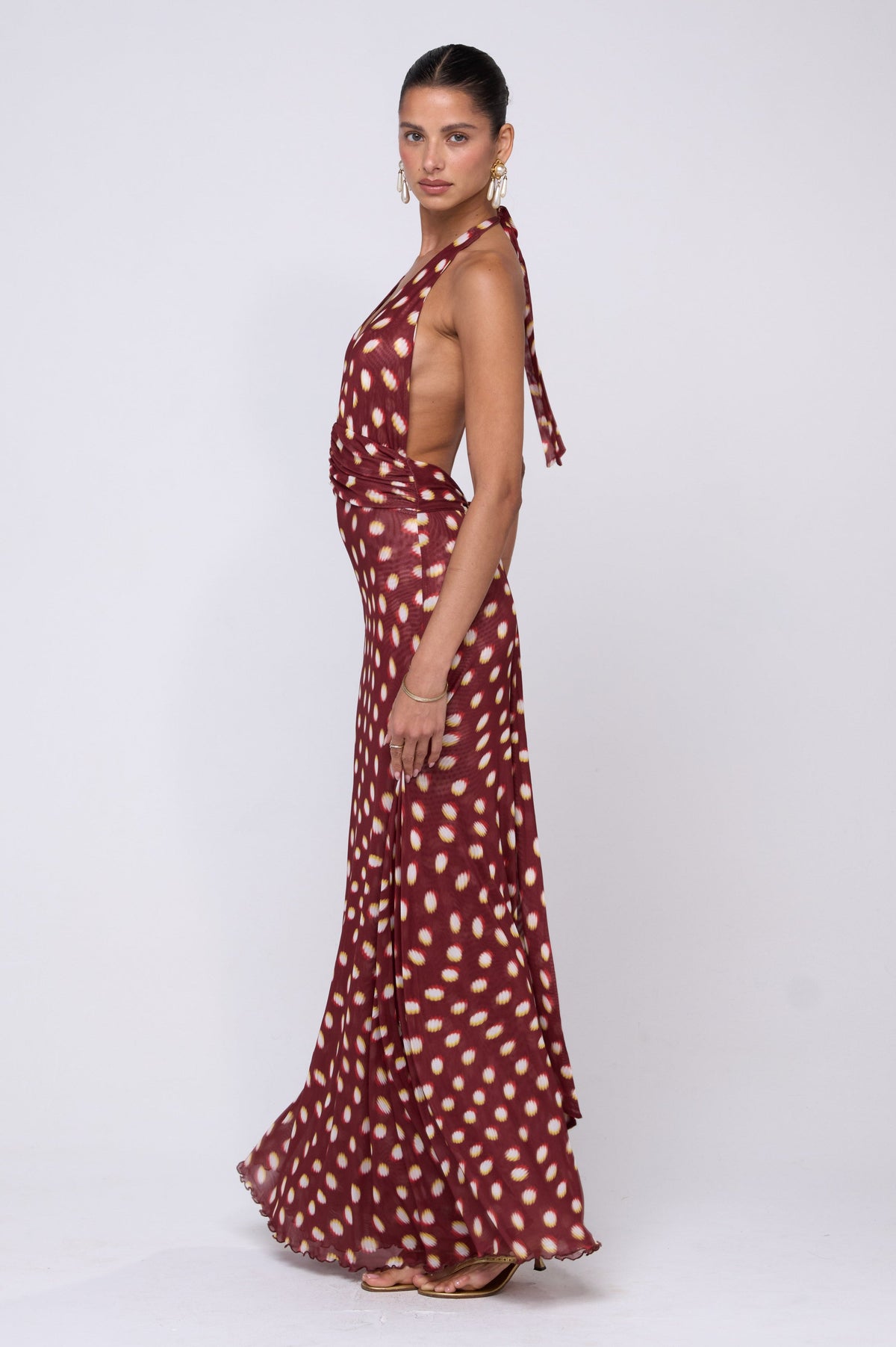 This is an image of Chelsea Maxi Dress in Spice - RESA featuring a model wearing the dress