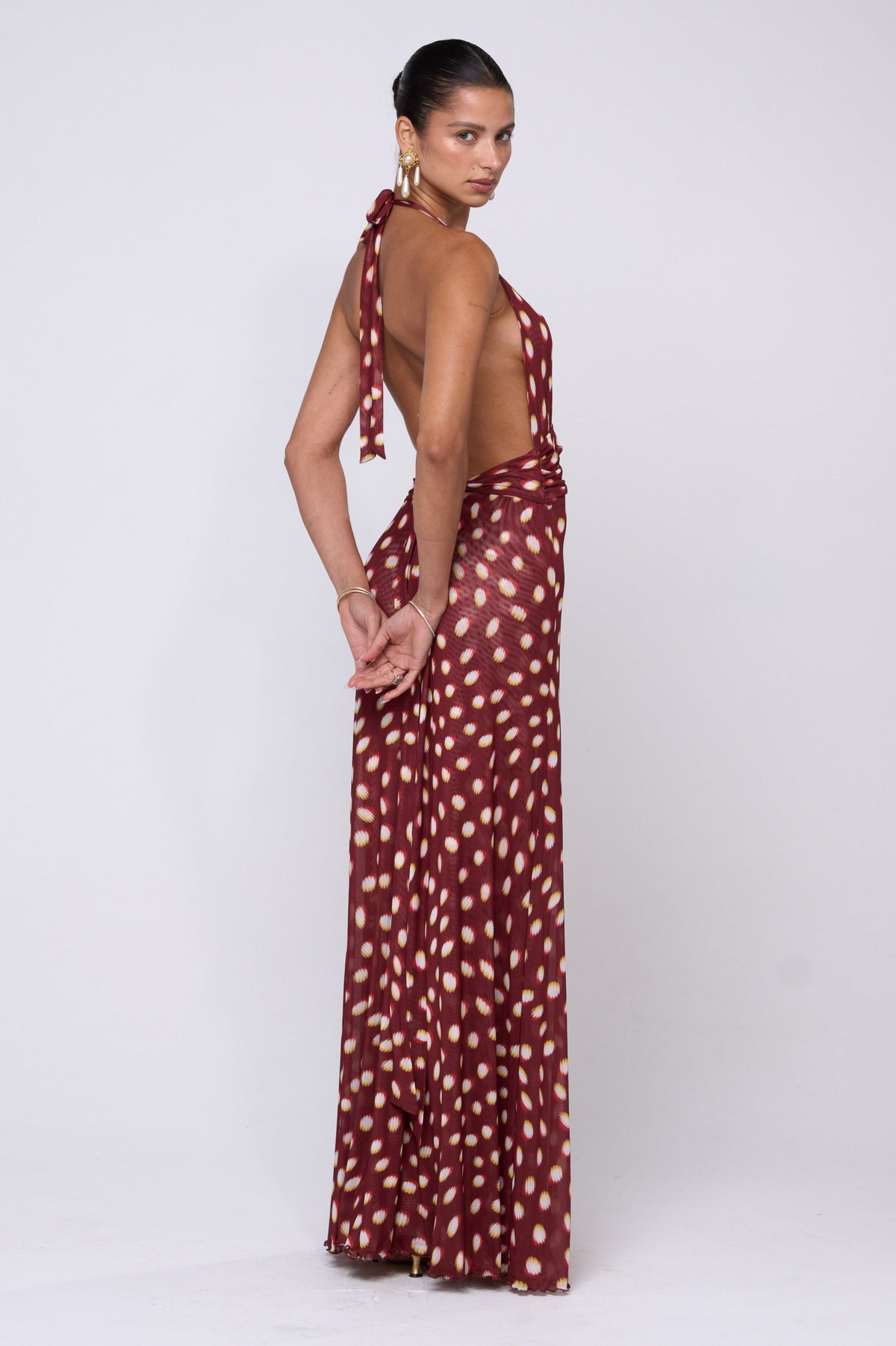 This is an image of Chelsea Maxi Dress in Spice - RESA featuring a model wearing the dress