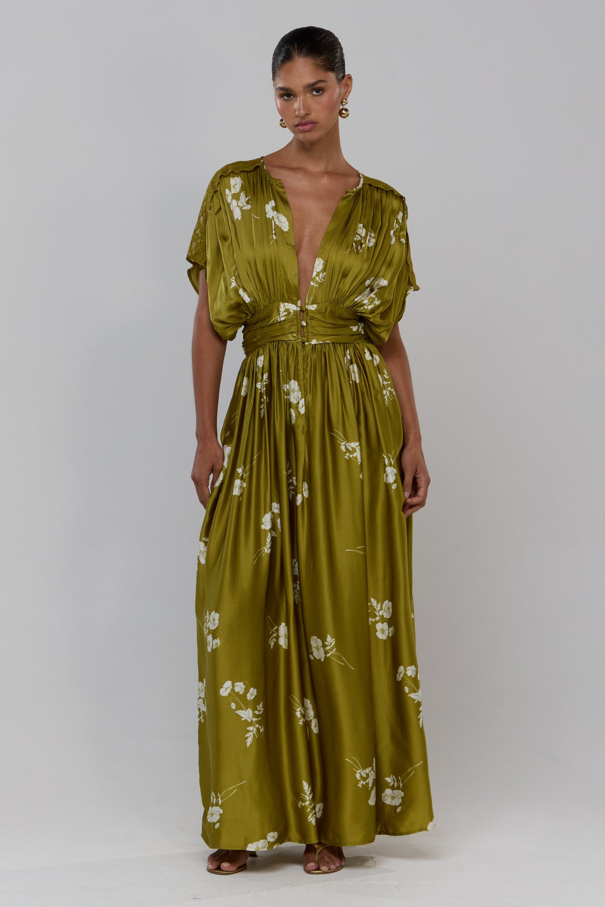 This is an image of Cher in Moss - RESA featuring a model wearing the dress