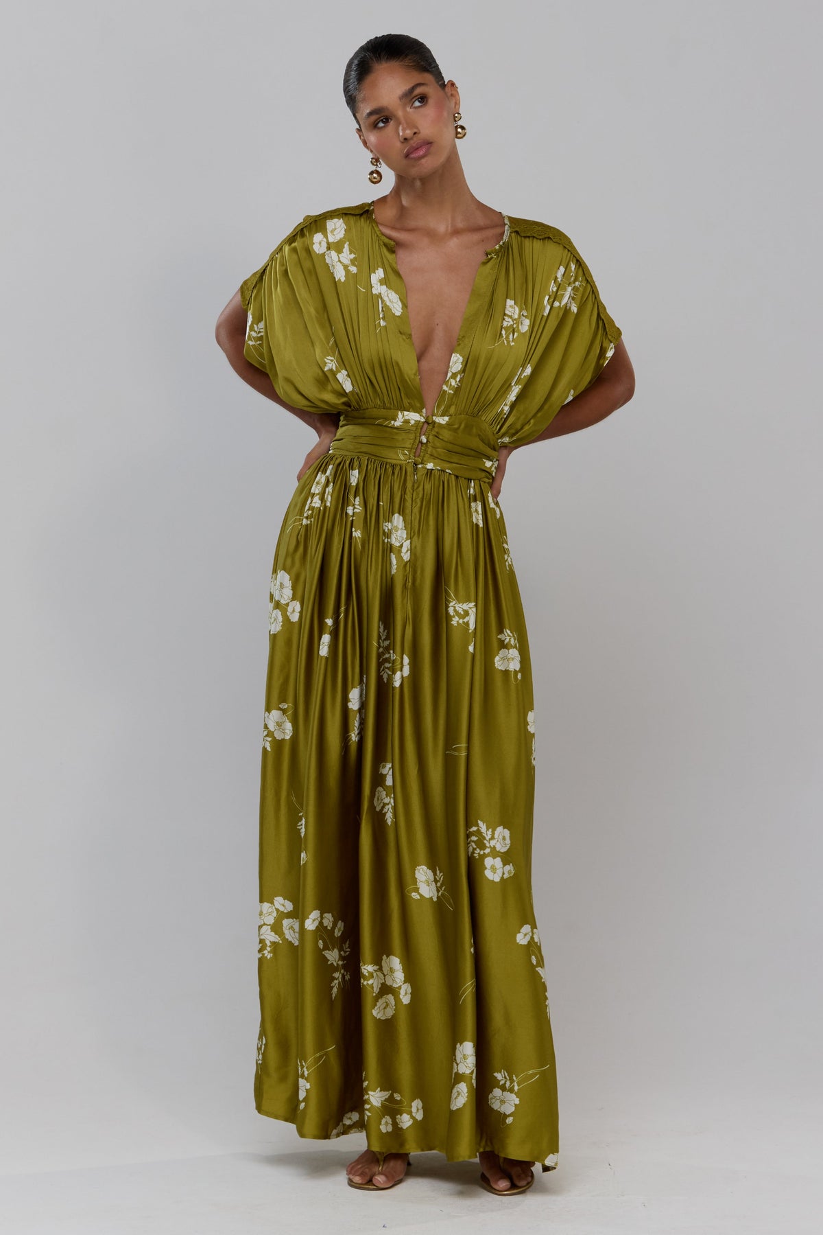 This is an image of Cher in Moss - RESA featuring a model wearing the dress