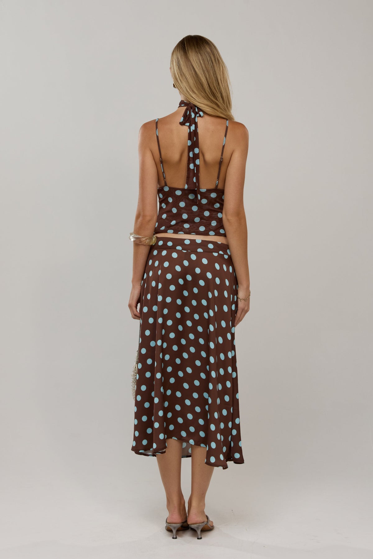 This is an image of Cindy in Costa - RESA featuring a model wearing the dress