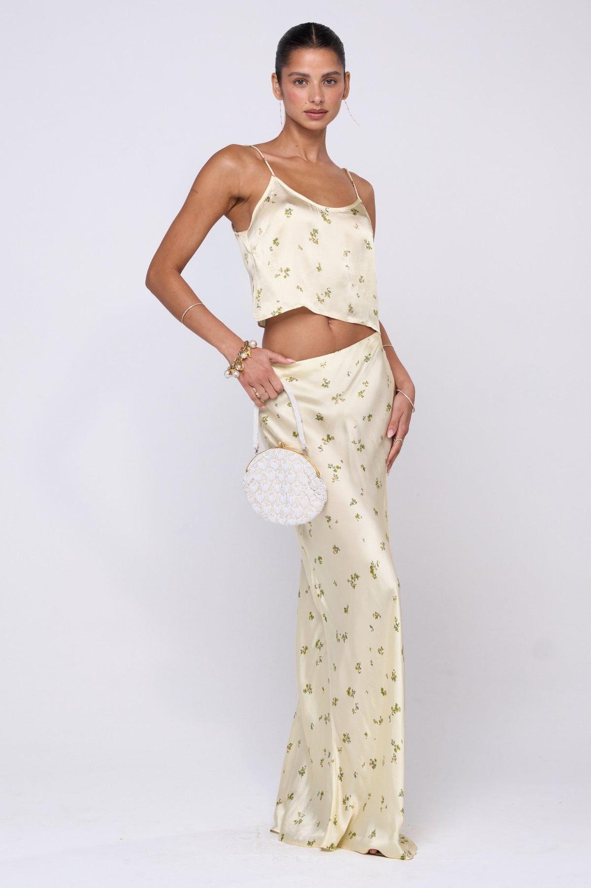This is an image of Claire Top in Beurre - RESA featuring a model wearing the dress