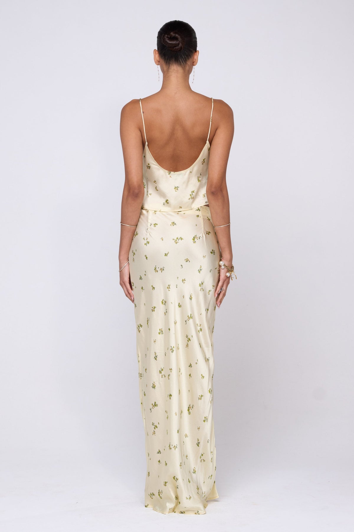 This is an image of Claire Top in Beurre - RESA featuring a model wearing the dress
