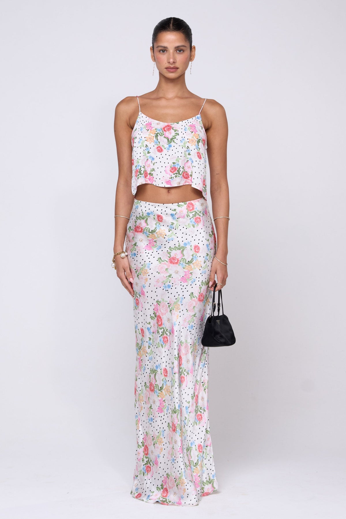 This is an image of Claire Top in Pois - RESA featuring a model wearing the dress