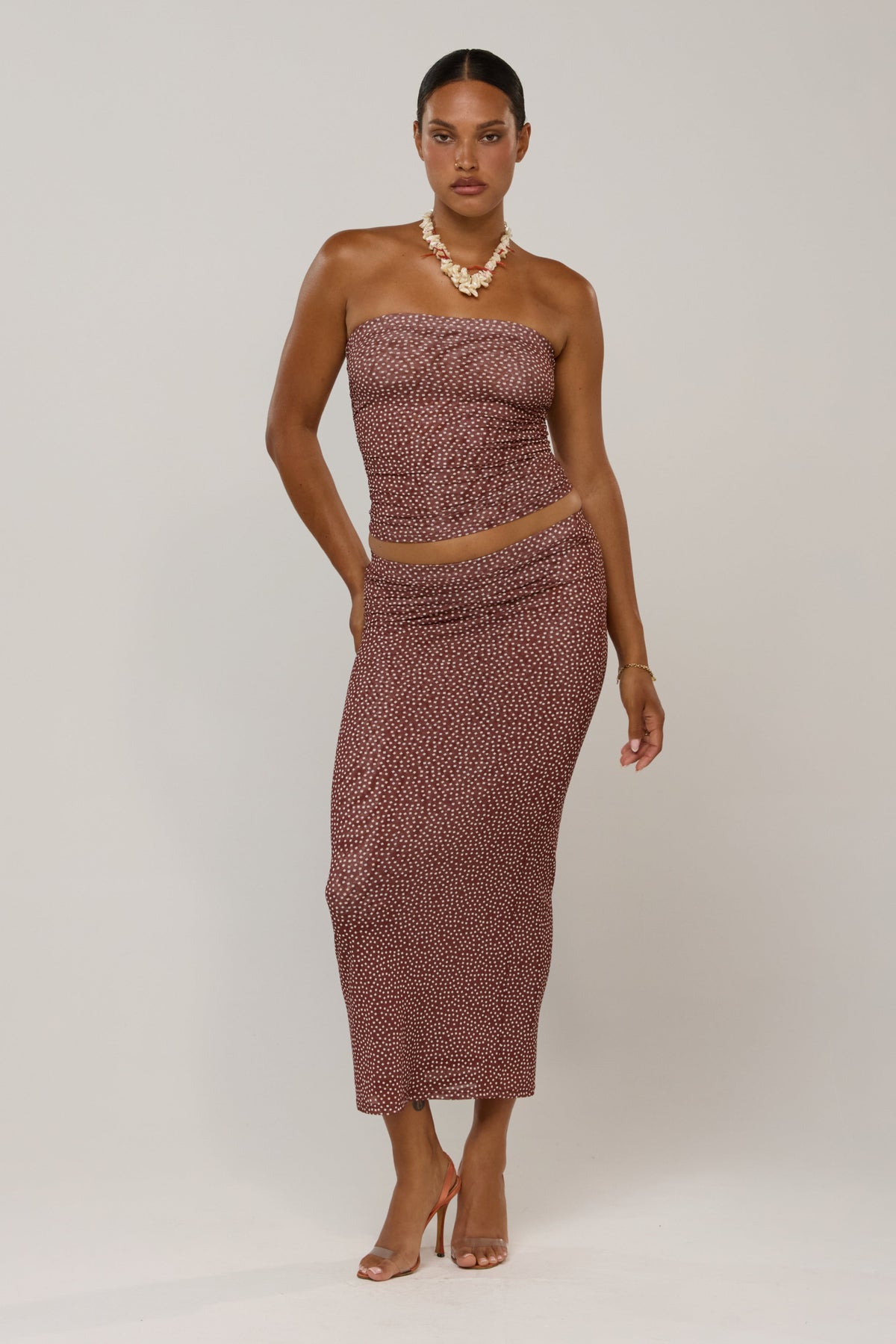 This is an image of Clyde in Coco Vanilla - RESA featuring a model wearing the dress