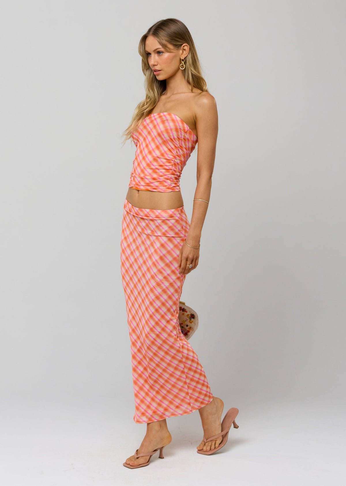 This is an image of Clyde Mesh Skirt in Sorbet - RESA featuring a model wearing the dress