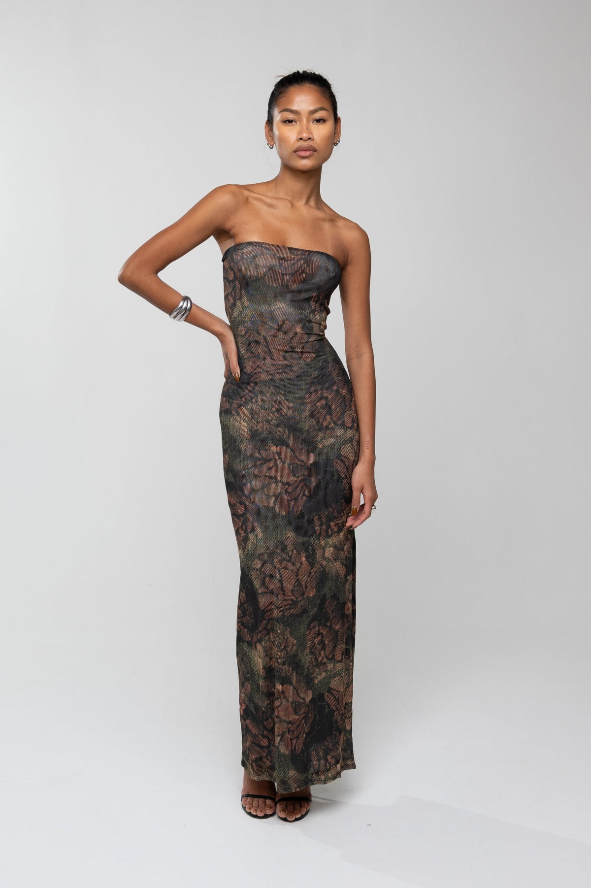 This is an image of Demi Dress in Autumn - RESA featuring a model wearing the dress