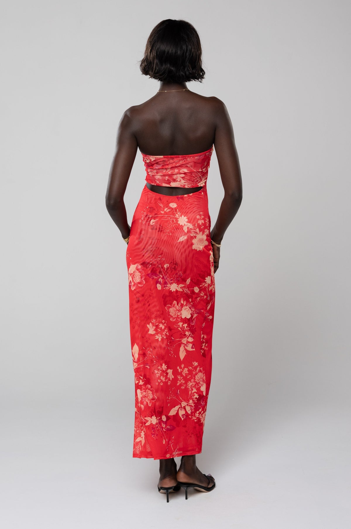 This is an image of Demi Dress in Blossom - RESA featuring a model wearing the dress