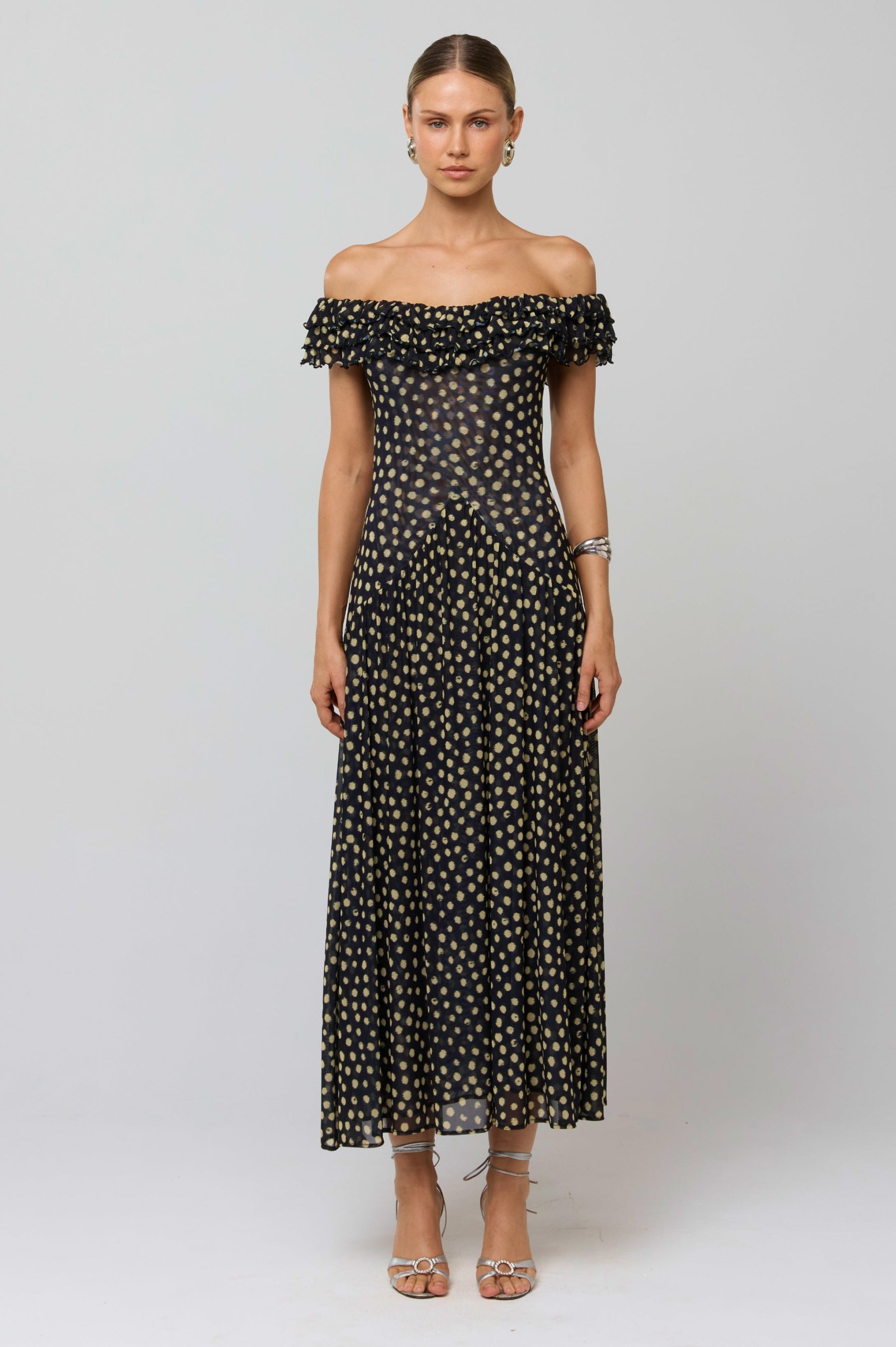 This is an image of Dolly Dress in Celeste - RESA featuring a model wearing the dress