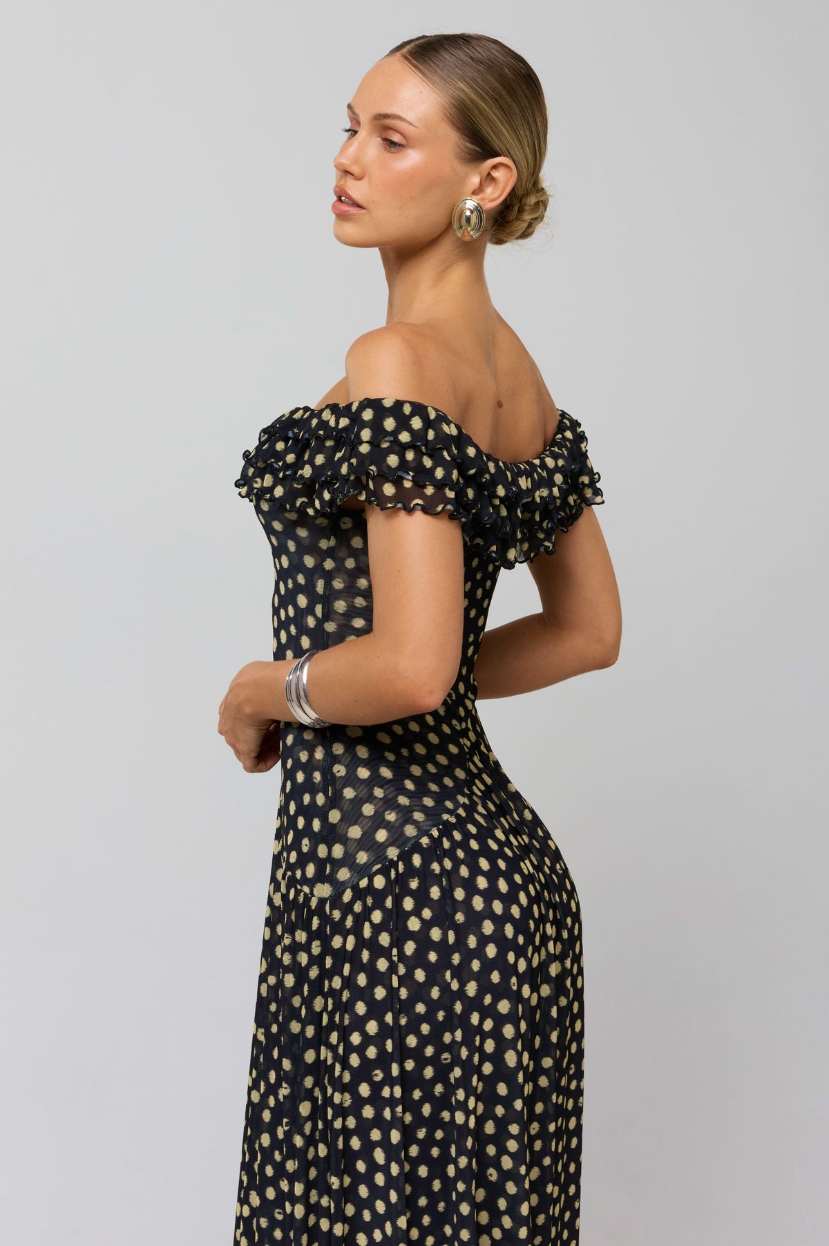 This is an image of Dolly Dress in Celeste - RESA featuring a model wearing the dress