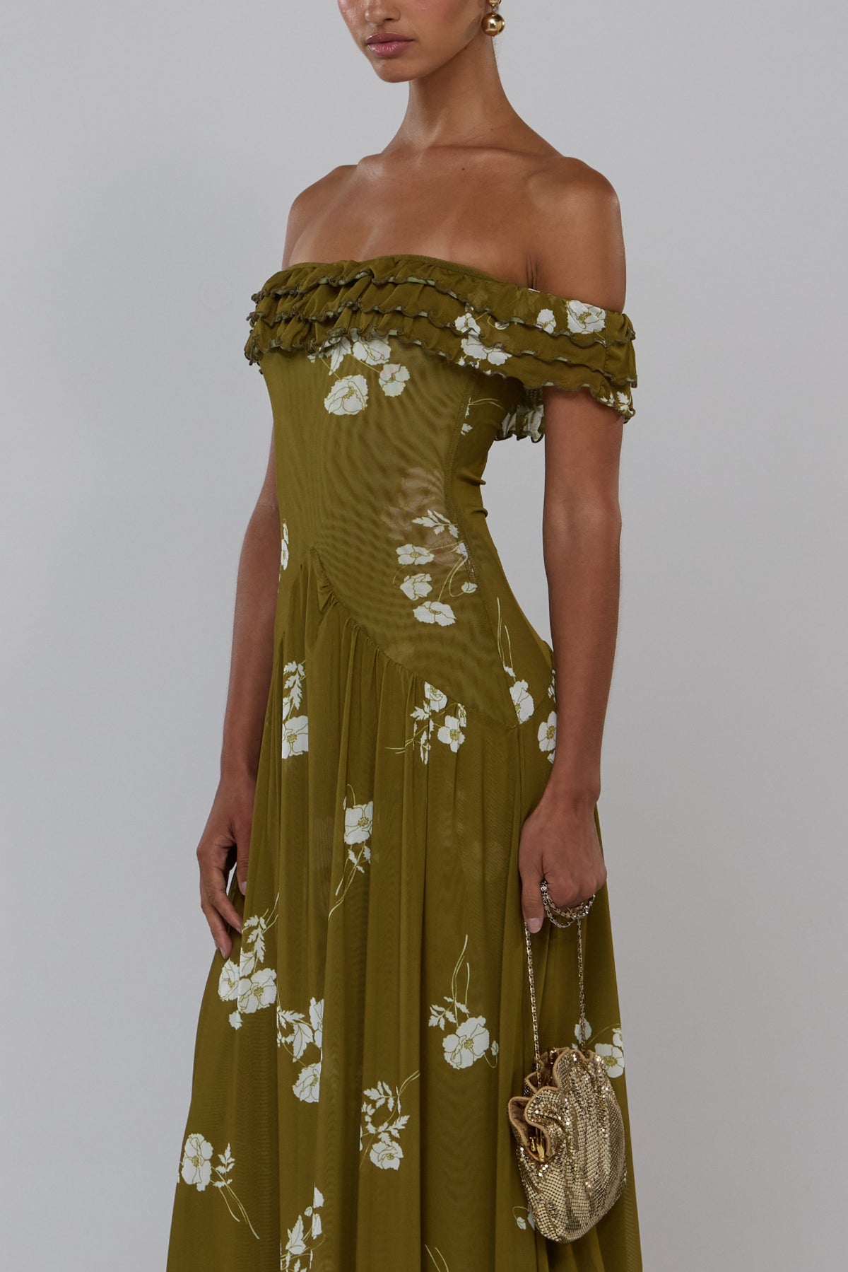 This is an image of Dolly in Moss - RESA featuring a model wearing the dress