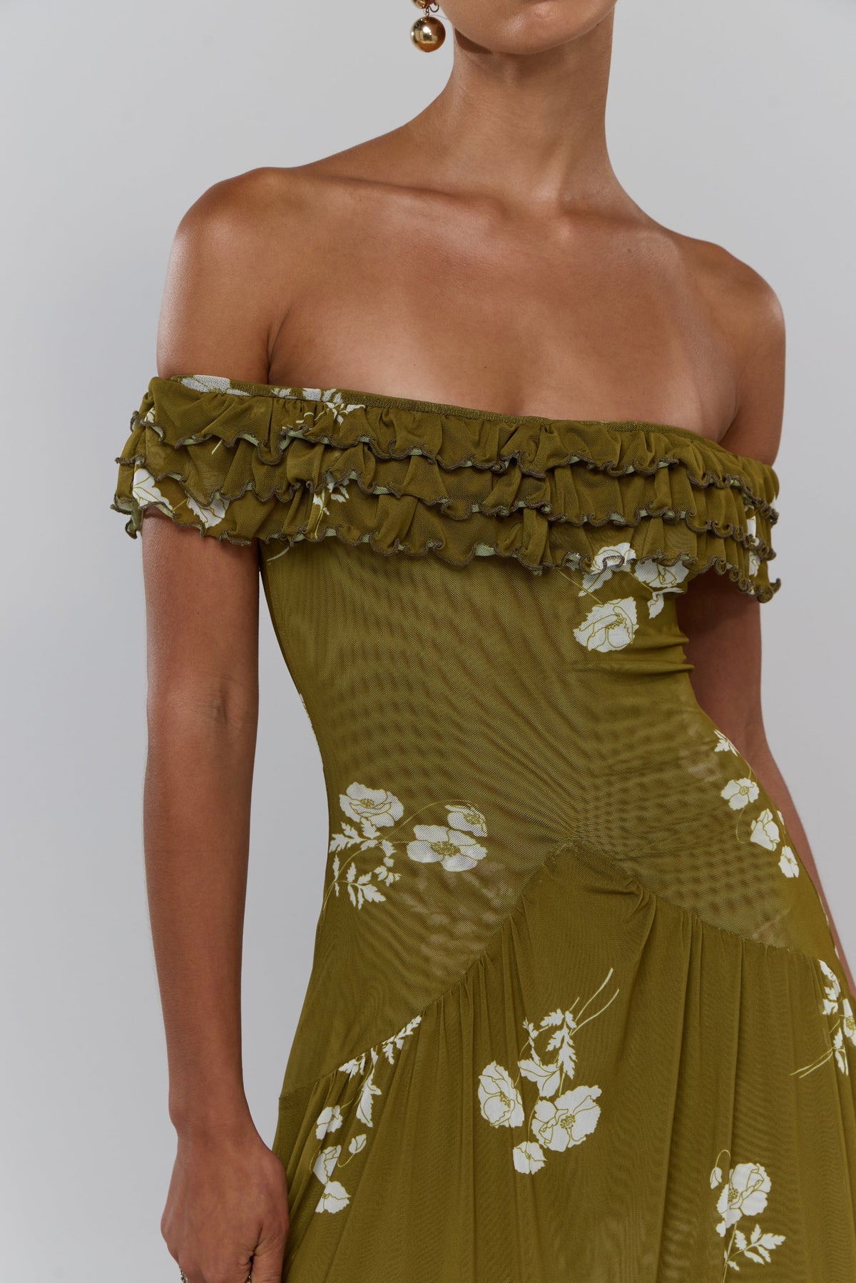 This is an image of Dolly in Moss - RESA featuring a model wearing the dress
