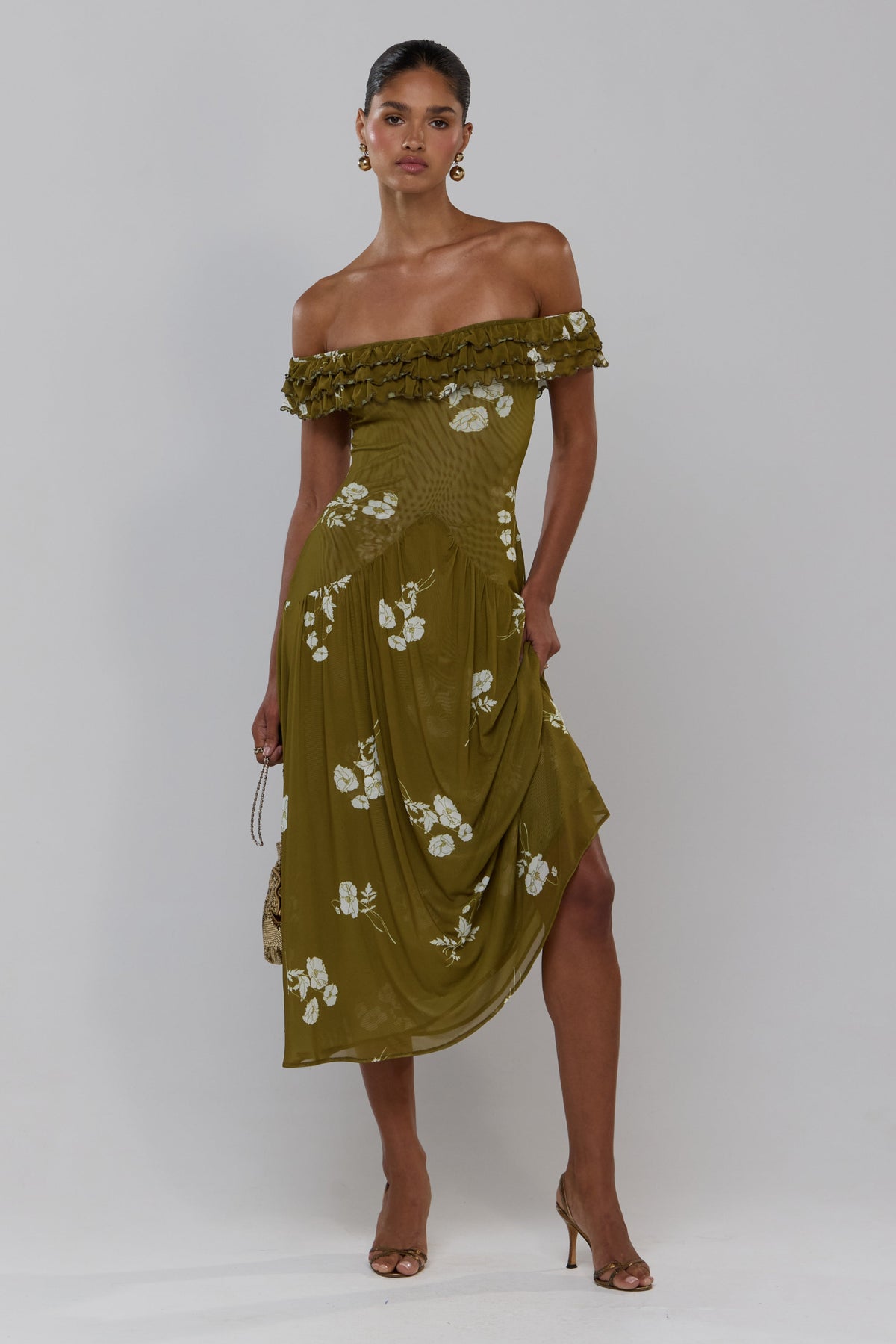 This is an image of Dolly in Moss - RESA featuring a model wearing the dress